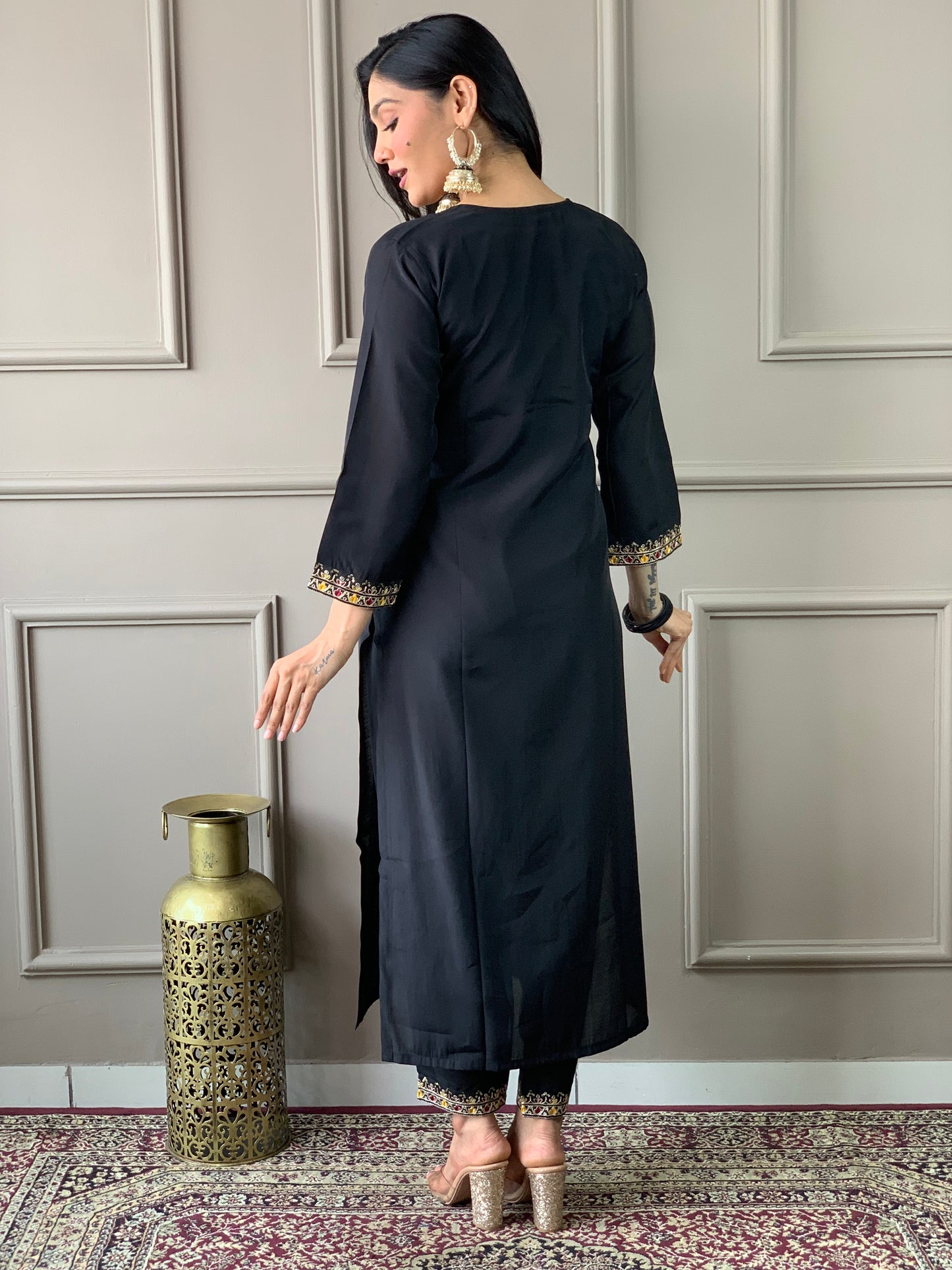Discover elegance with our beautifully designed black embroidered outfit, featuring intricate floral patterns and a matching dupatta.