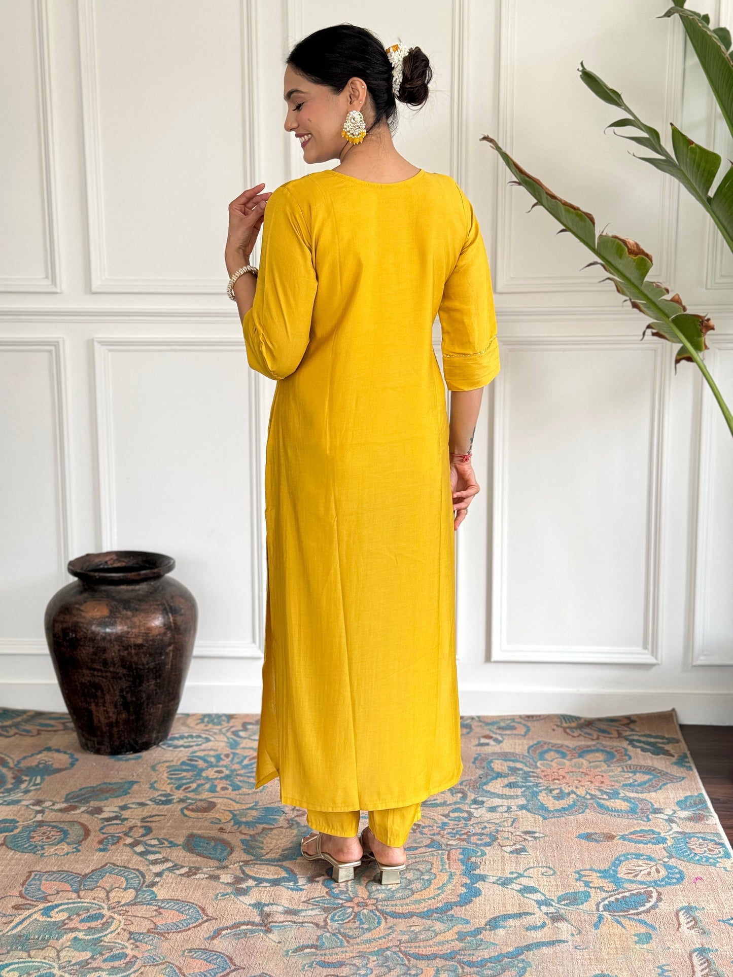 Brighten up your wardrobe with this radiant yellow kurti set, adorned with delicate floral embroidery and a sheer, printed dupatta