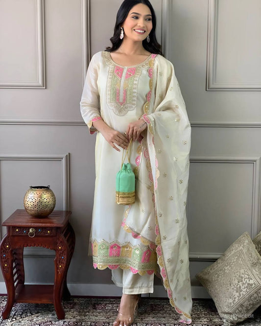 Elevate your elegance with this stunning off-white embroidered Kurti set. Adorned with delicate pink and gold accents, it features intricate detailing, a graceful dupatta