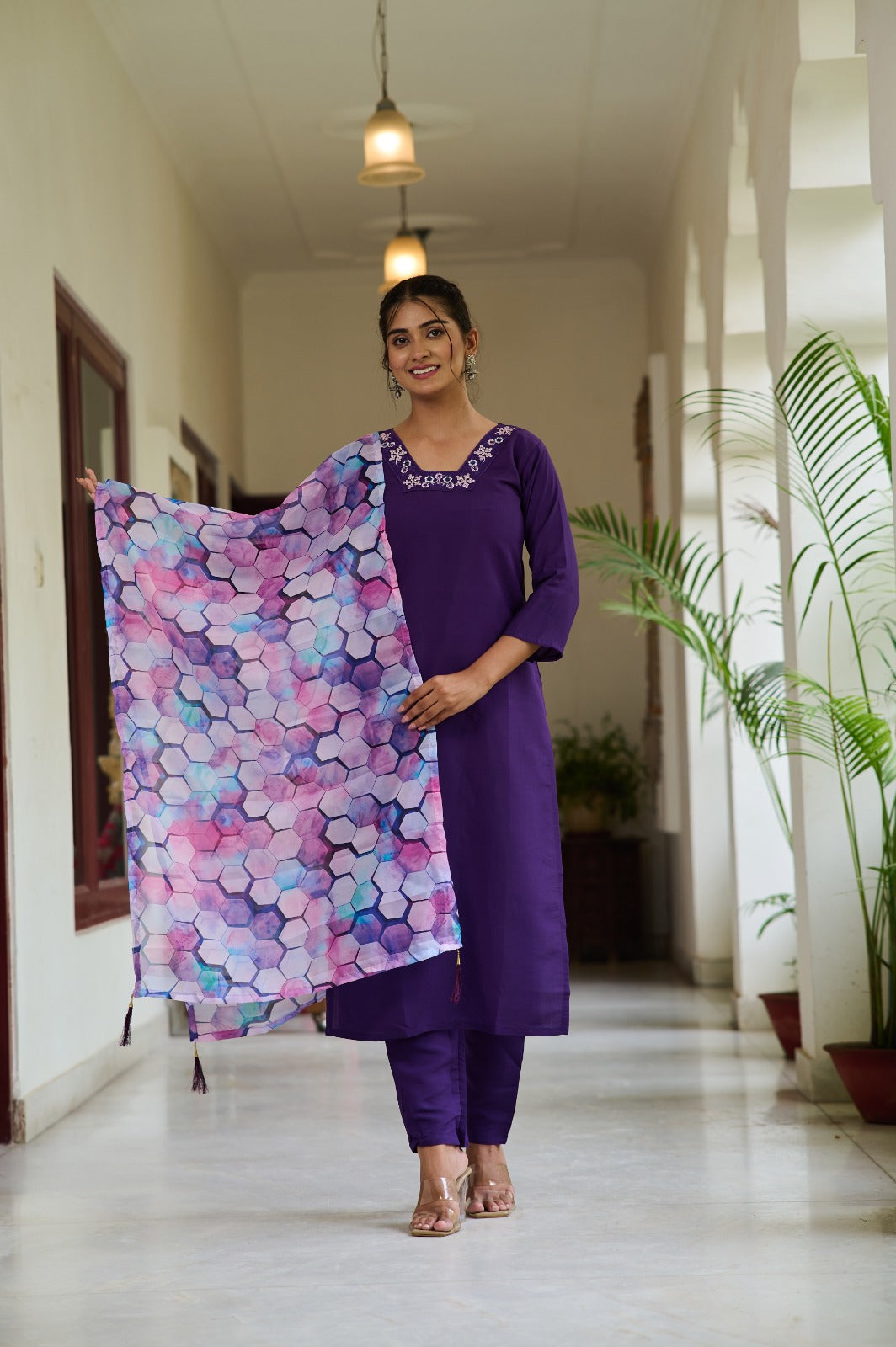 Embrace elegance with this deep purple Kurti set, featuring delicate embroidery on the neckline and a vibrant printed dupatta