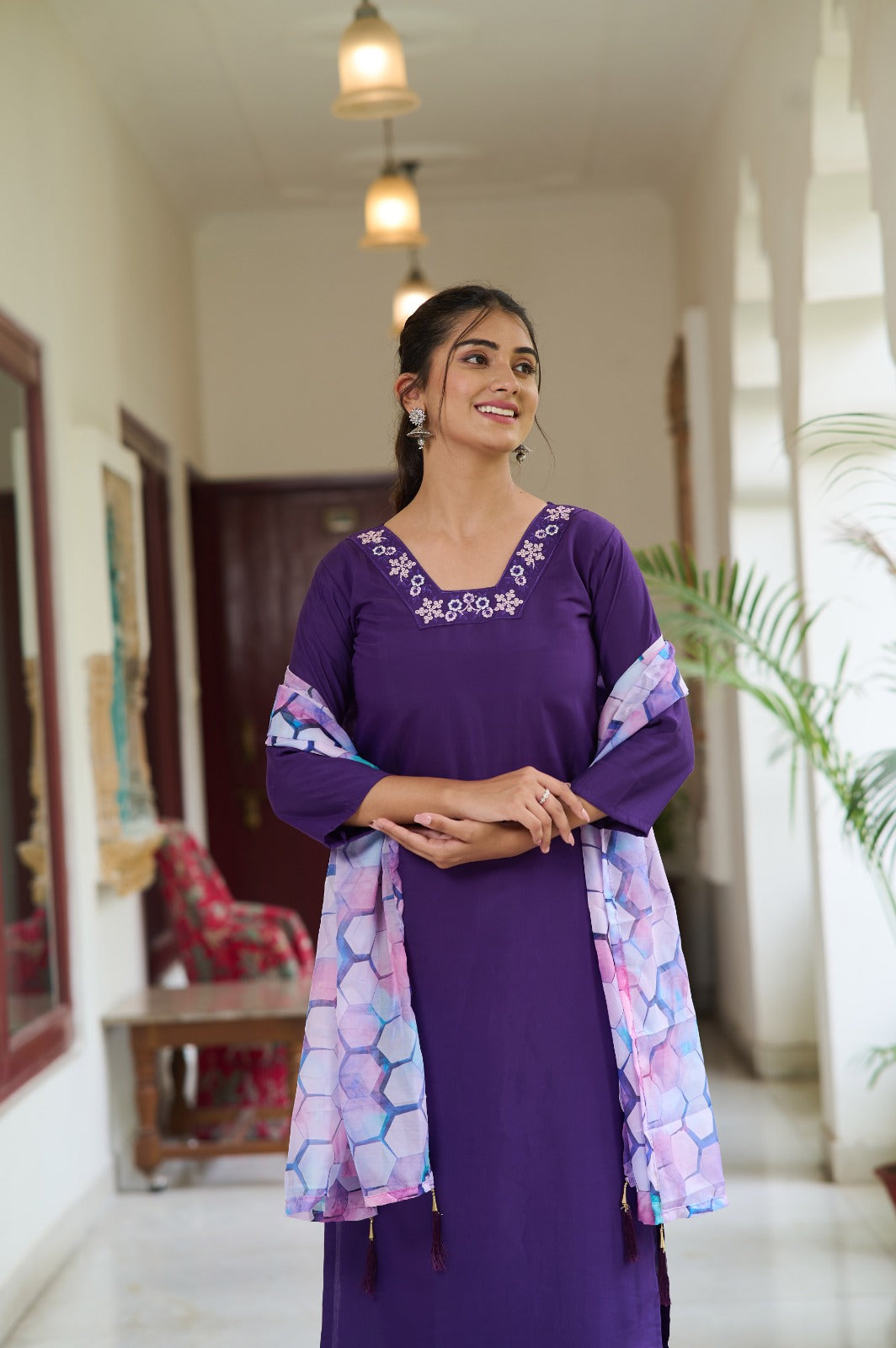 Embrace elegance with this deep purple Kurti set, featuring delicate embroidery on the neckline and a vibrant printed dupatta