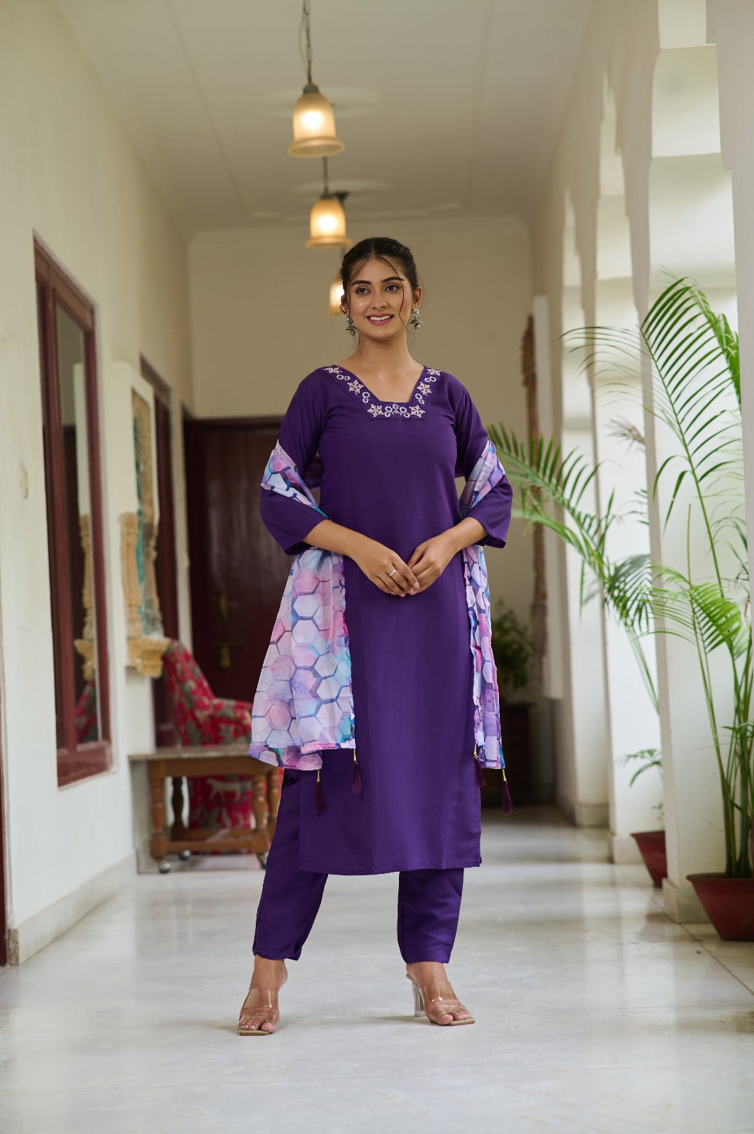 Embrace elegance with this deep purple Kurti set, featuring delicate embroidery on the neckline and a vibrant printed dupatta