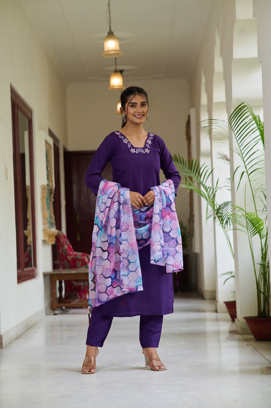 Embrace elegance with this deep purple Kurti set, featuring delicate embroidery on the neckline and a vibrant printed dupatta