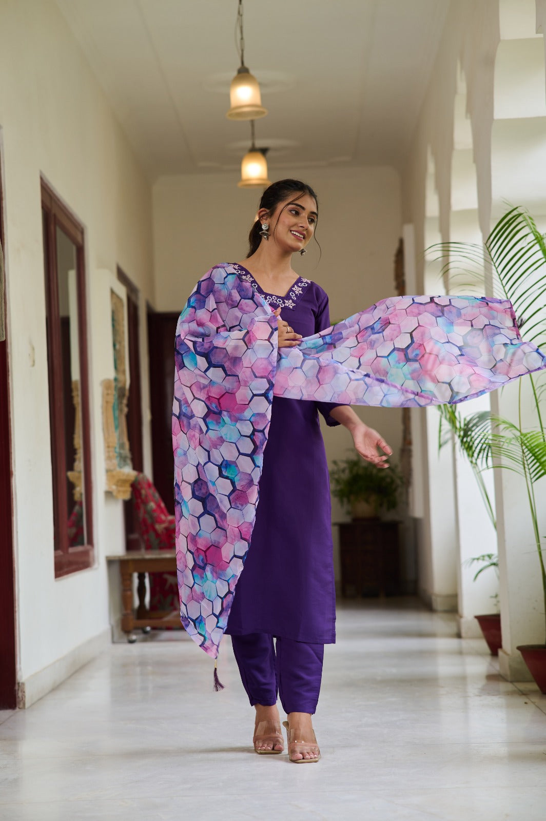 Embrace elegance with this deep purple Kurti set, featuring delicate embroidery on the neckline and a vibrant printed dupatta