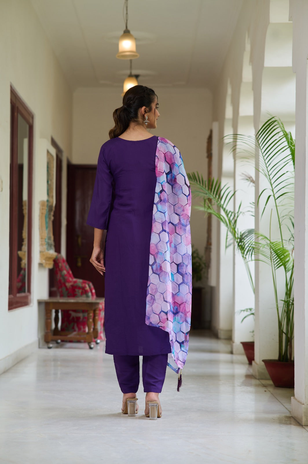 Embrace elegance with this deep purple Kurti set, featuring delicate embroidery on the neckline and a vibrant printed dupatta