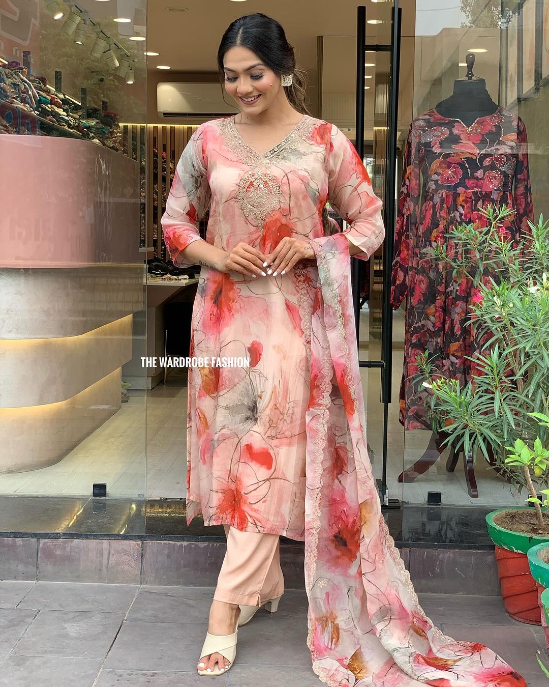 Elevate your style with this stunning floral-printed kurti set. Designed in soft pastel hues with delicate embroidery, it exudes elegance and charm