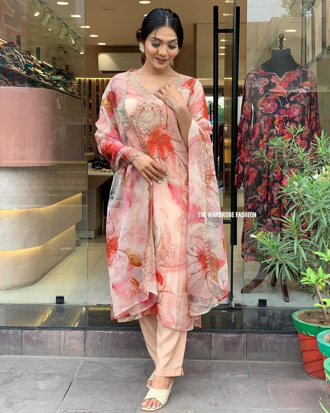 Elevate your style with this stunning floral-printed kurti set. Designed in soft pastel hues with delicate embroidery, it exudes elegance and charm