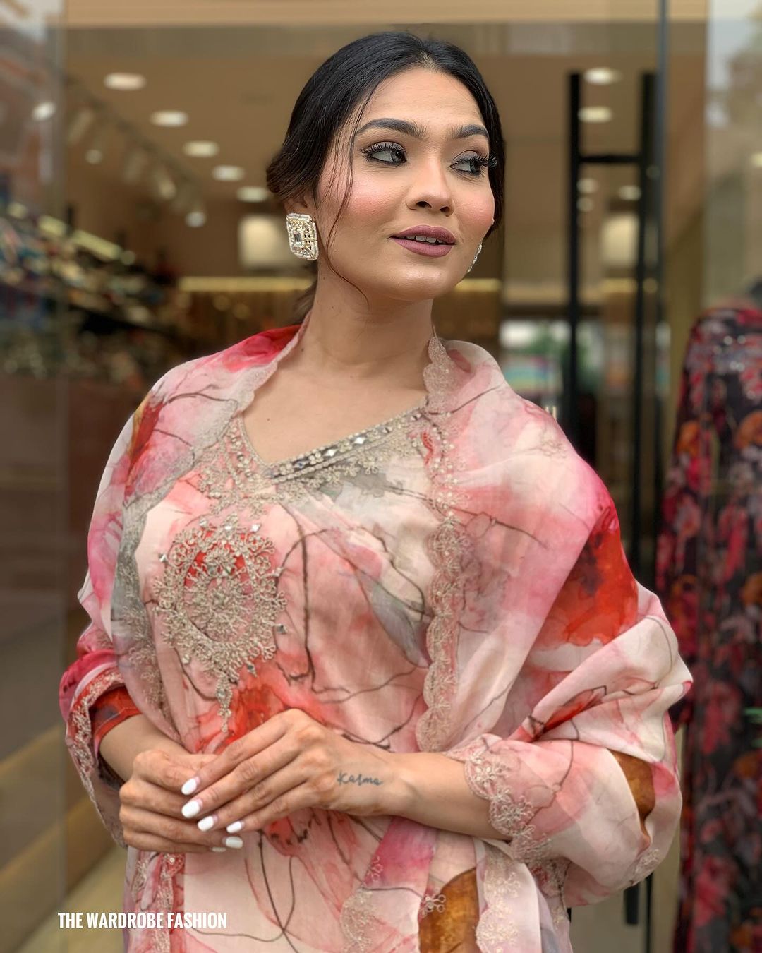Elevate your style with this stunning floral-printed kurti set. Designed in soft pastel hues with delicate embroidery, it exudes elegance and charm
