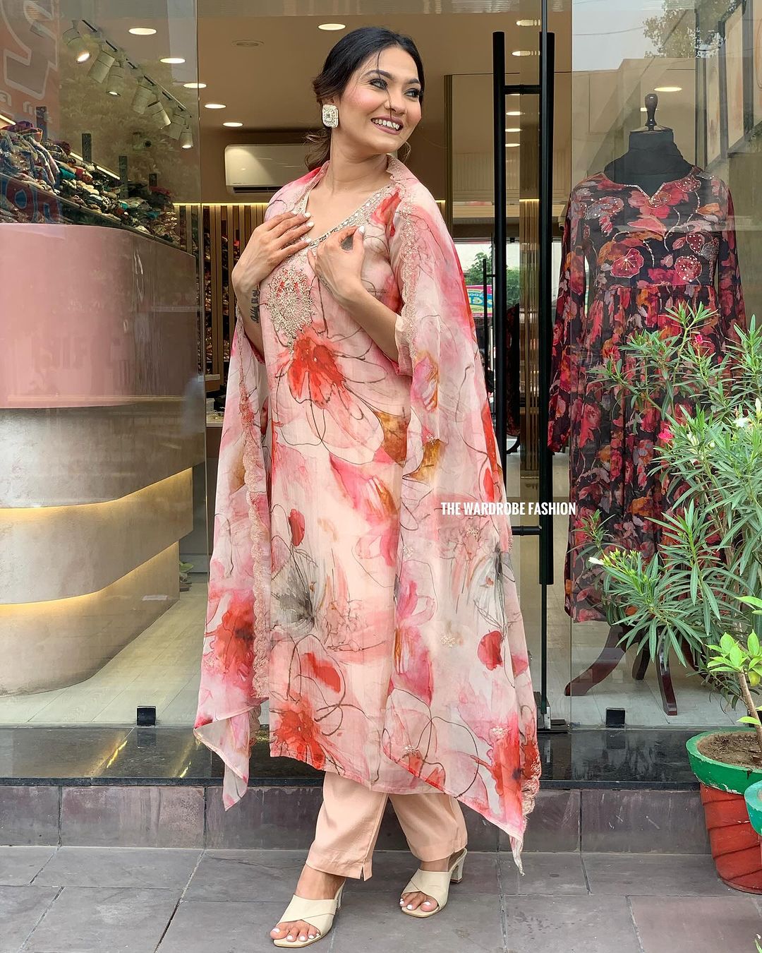 Elevate your style with this stunning floral-printed kurti set. Designed in soft pastel hues with delicate embroidery, it exudes elegance and charm