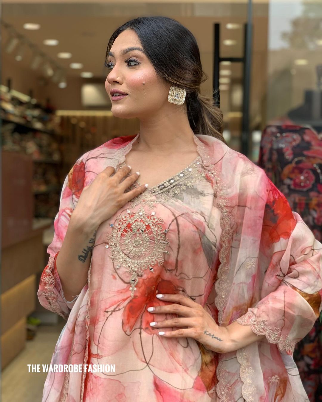Elevate your style with this stunning floral-printed kurti set. Designed in soft pastel hues with delicate embroidery, it exudes elegance and charm