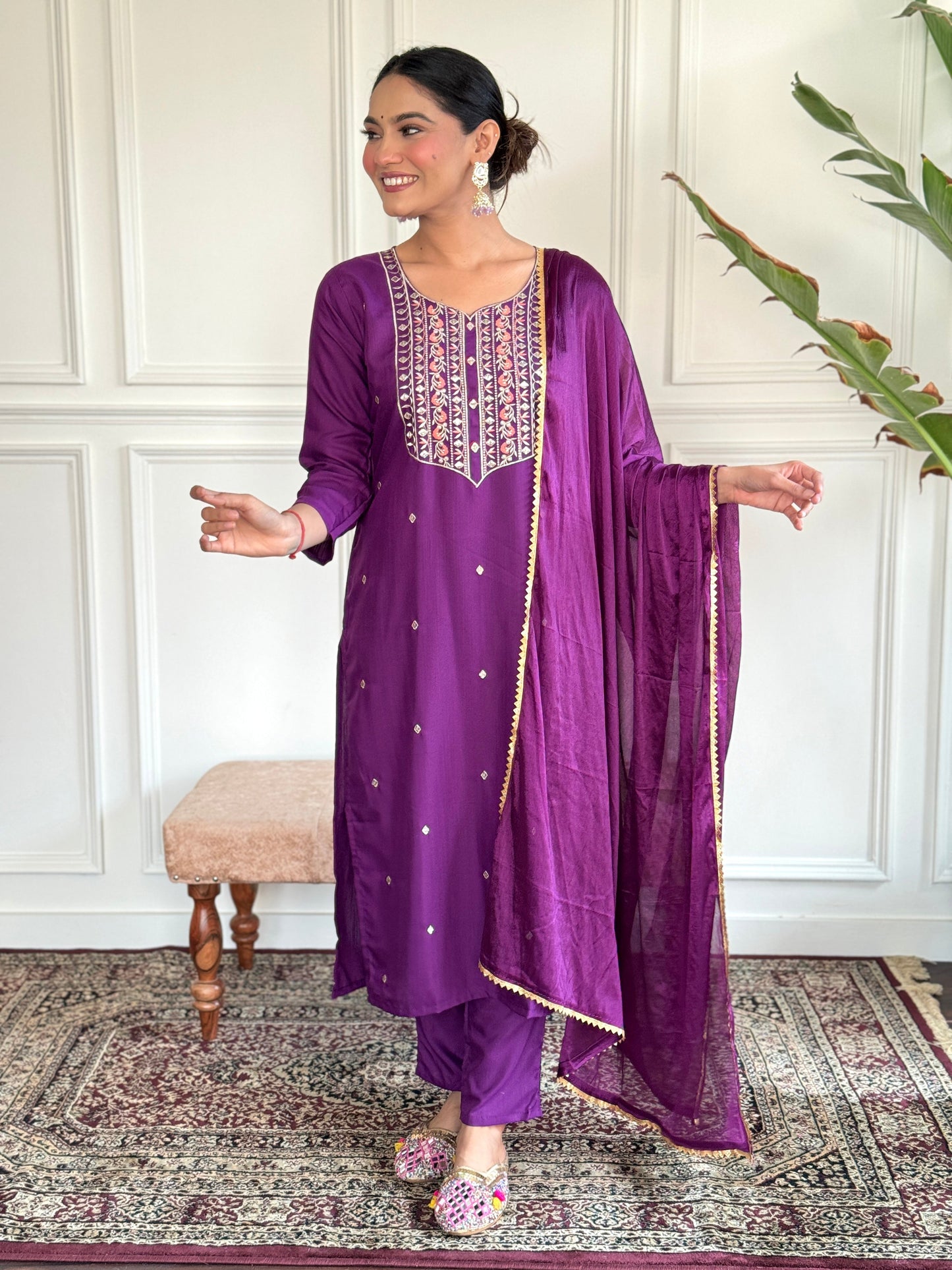 Elevate your style with this elegant purple Kurti set, featuring intricate embroidery and delicate embellishments