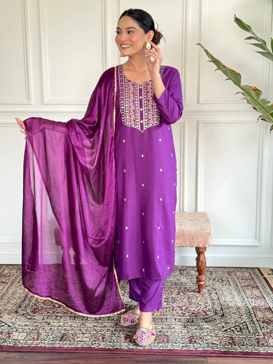 Elevate your style with this elegant purple Kurti set, featuring intricate embroidery and delicate embellishments