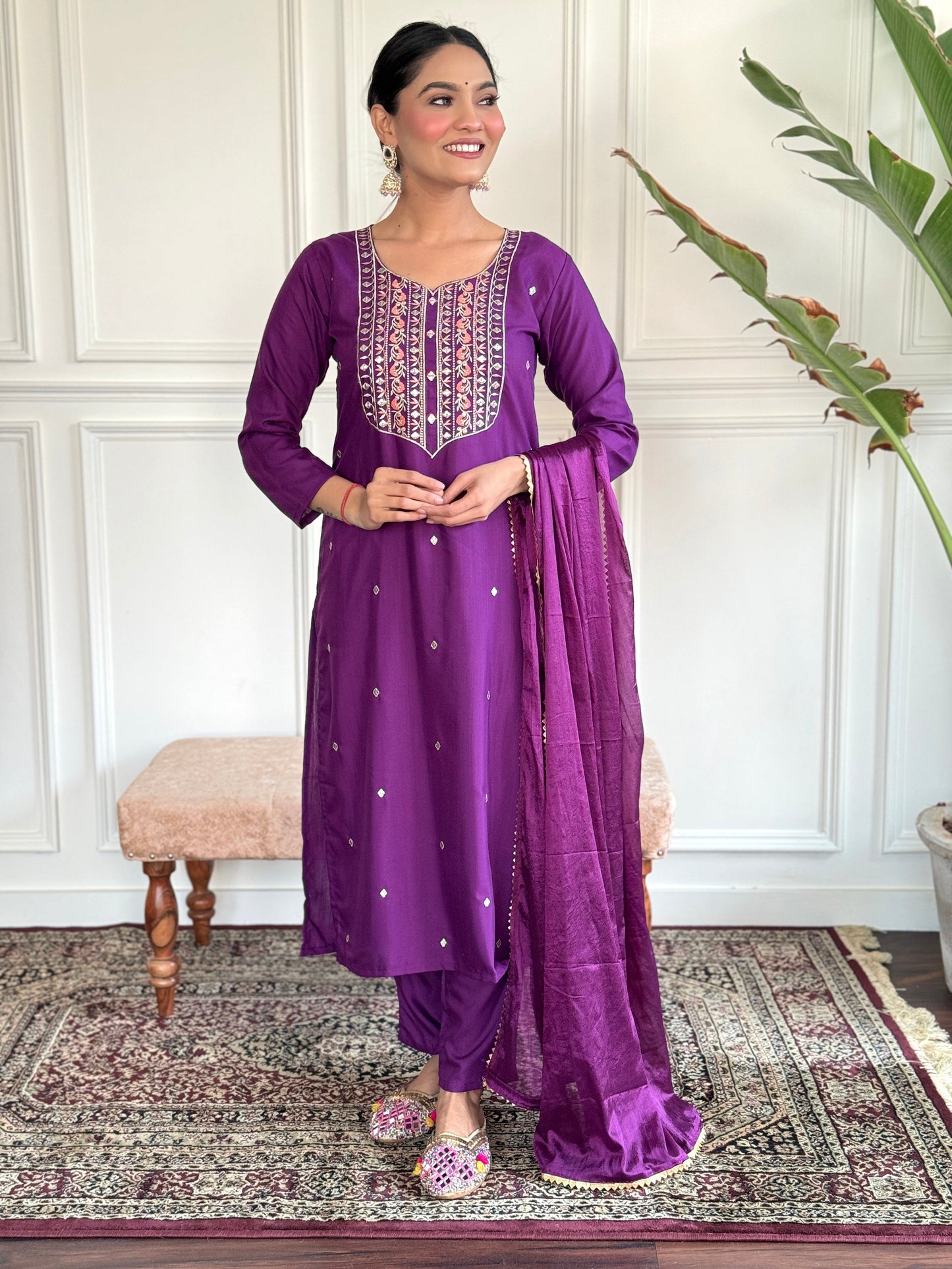 Elevate your style with this elegant purple Kurti set, featuring intricate embroidery and delicate embellishments