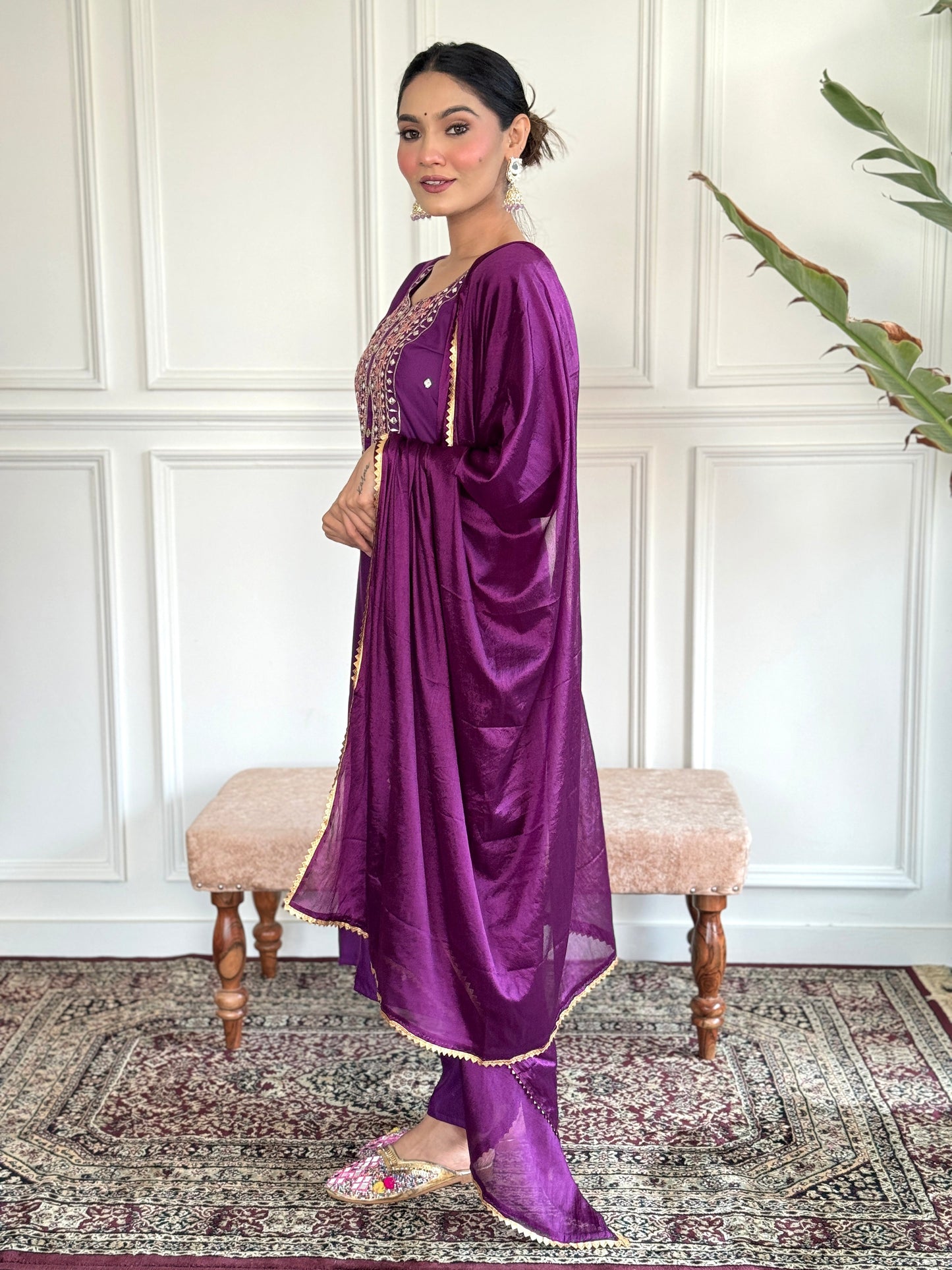 Elevate your style with this elegant purple Kurti set, featuring intricate embroidery and delicate embellishments