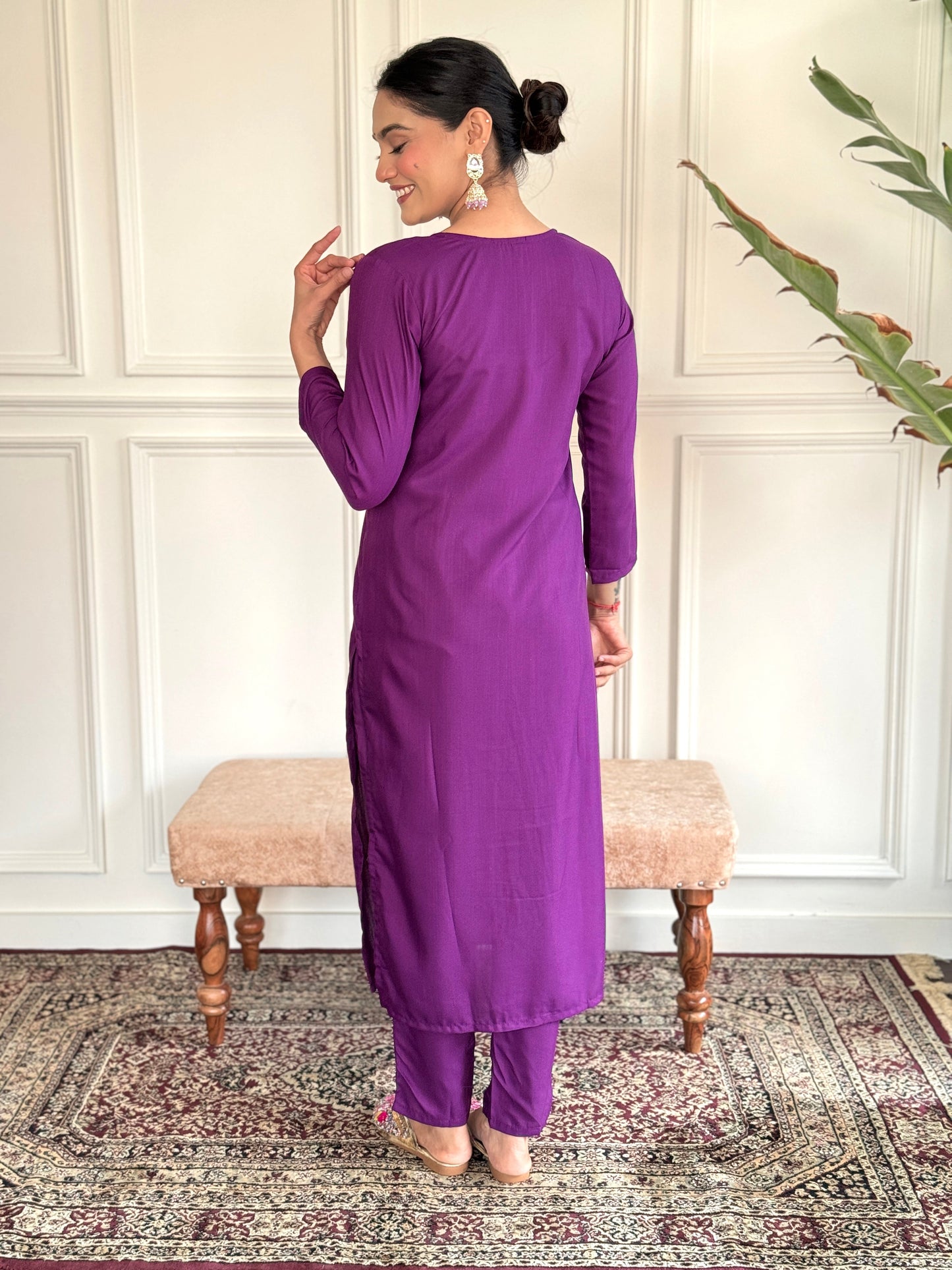 Elevate your style with this elegant purple Kurti set, featuring intricate embroidery and delicate embellishments
