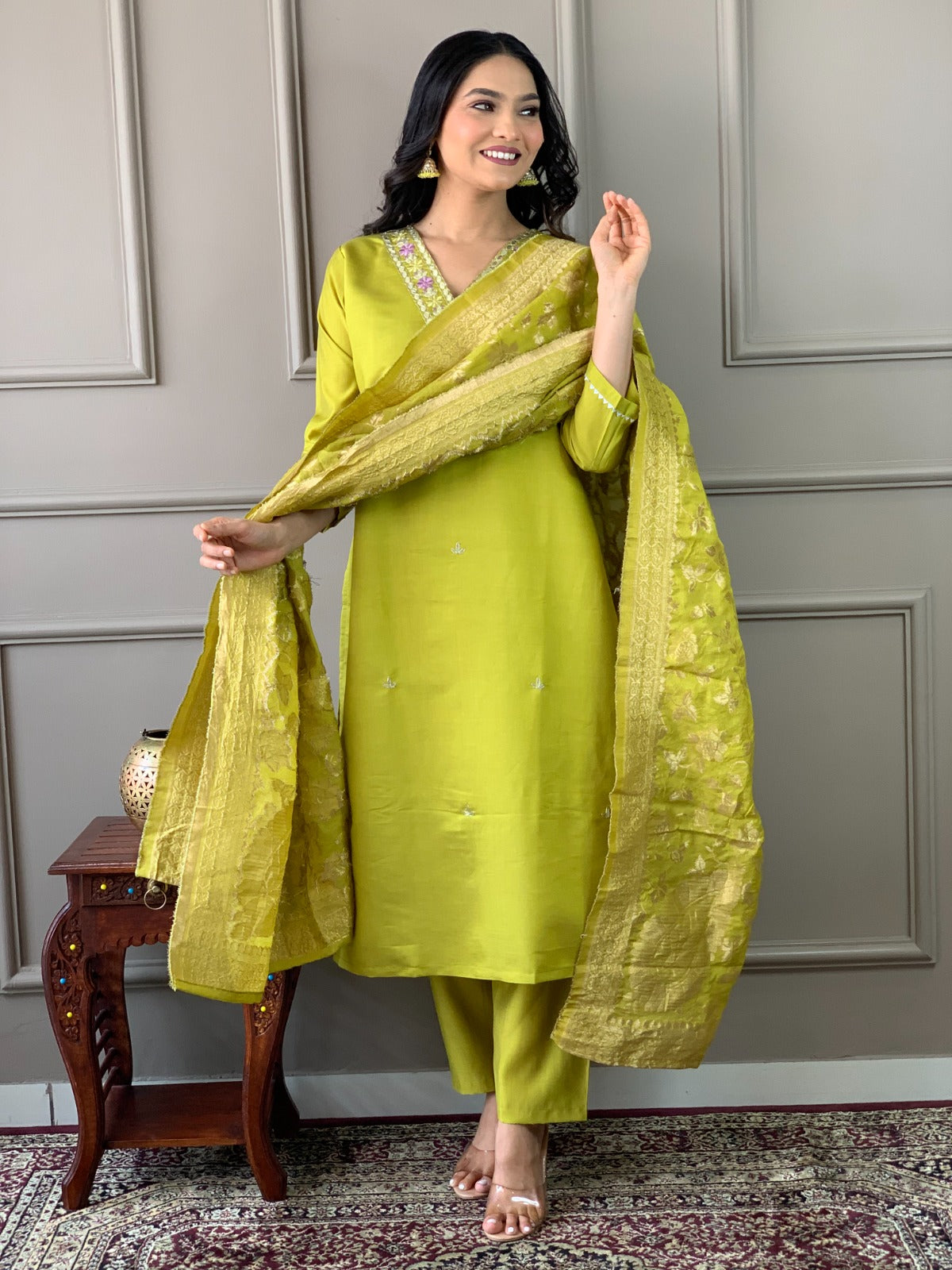 Embrace sophistication with this lime-green kurti set, featuring delicate floral embroidery and a luxurious Banarasi dupatta