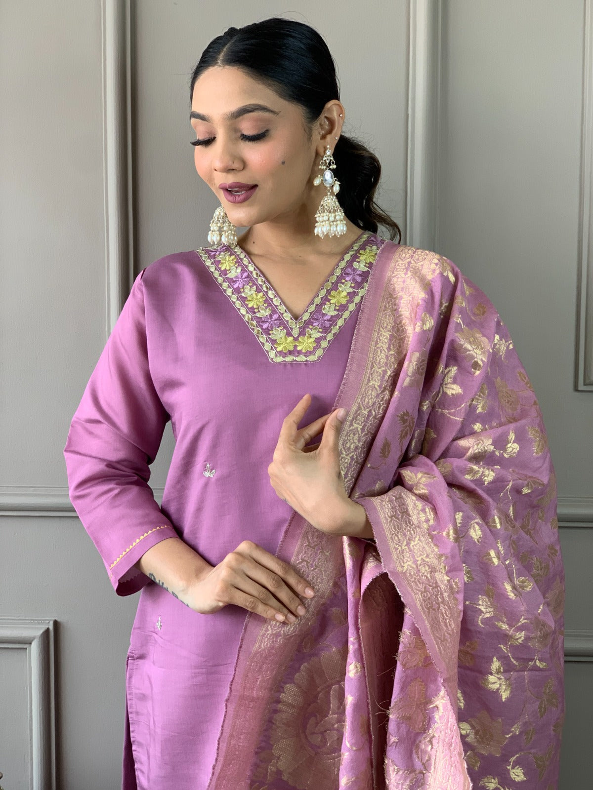 Embrace sophistication with this lime-green kurti set, featuring delicate floral embroidery and a luxurious Banarasi dupatta