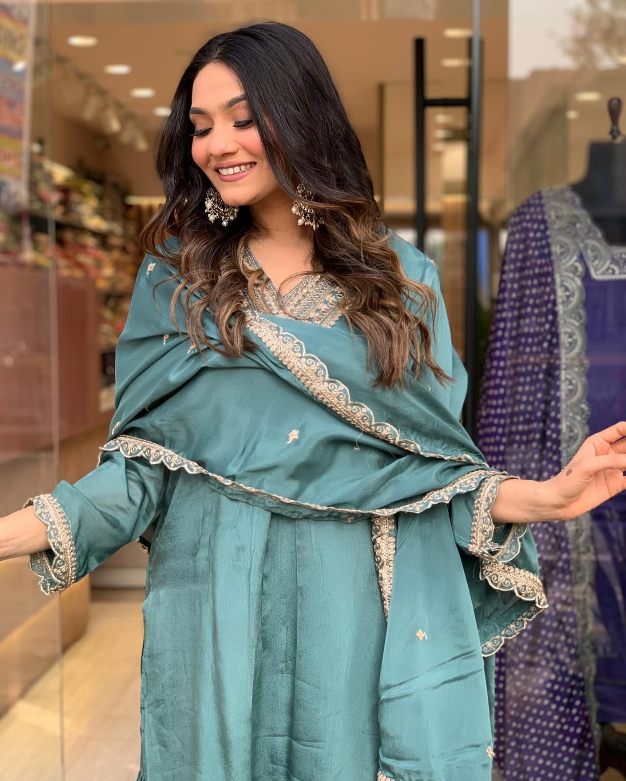 Elevate your style with this elegant teal kurti set, featuring intricate embroidery, delicate lacework, and a flowy silhouette