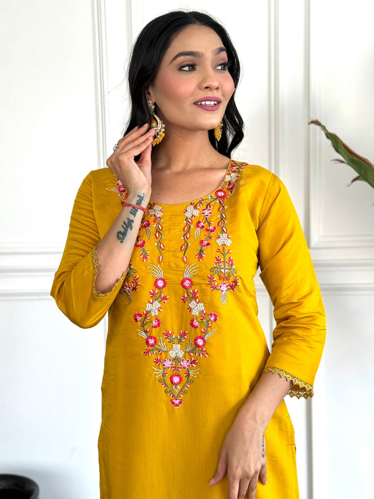 Elevate your style with this vibrant mustard yellow kurti set, adorned with intricate floral embroidery and a beautifully printed dupatta