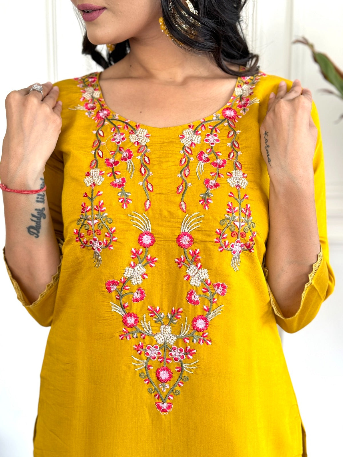 Elevate your style with this vibrant mustard yellow kurti set, adorned with intricate floral embroidery and a beautifully printed dupatta