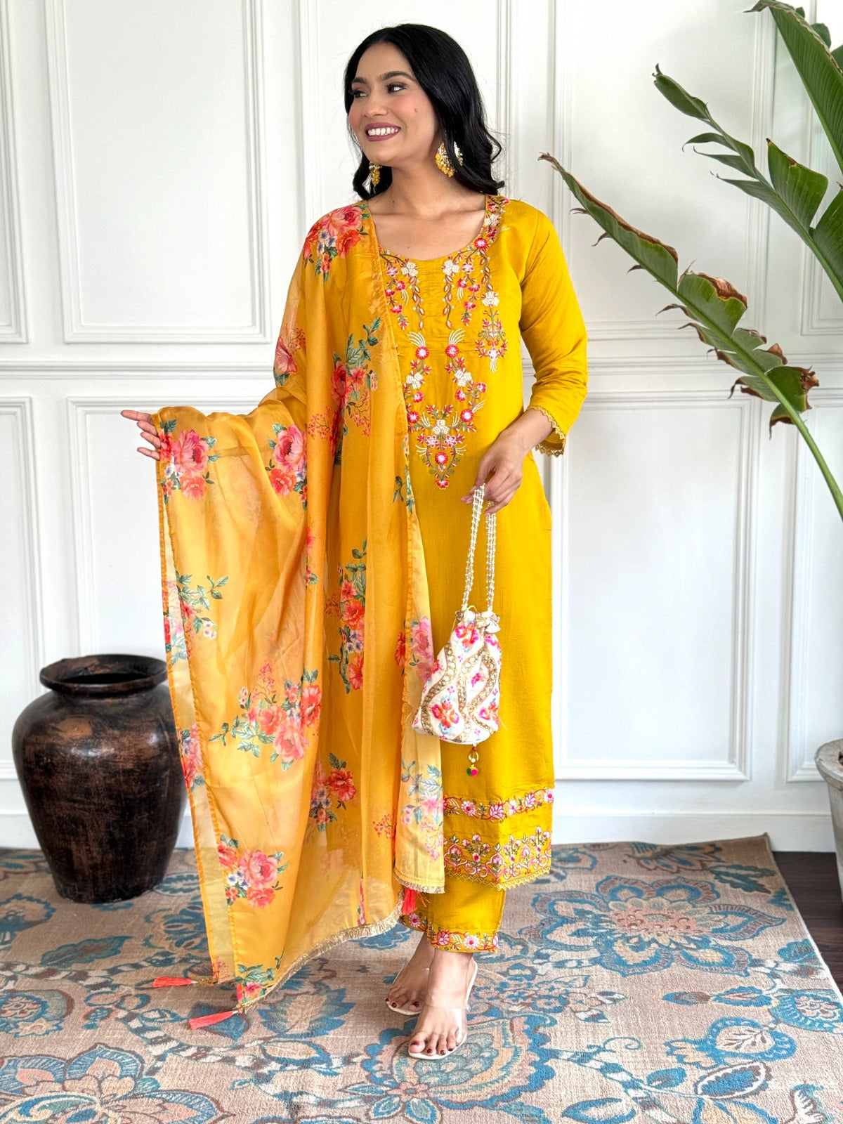 Elevate your style with this vibrant mustard yellow kurti set, adorned with intricate floral embroidery and a beautifully printed dupatta