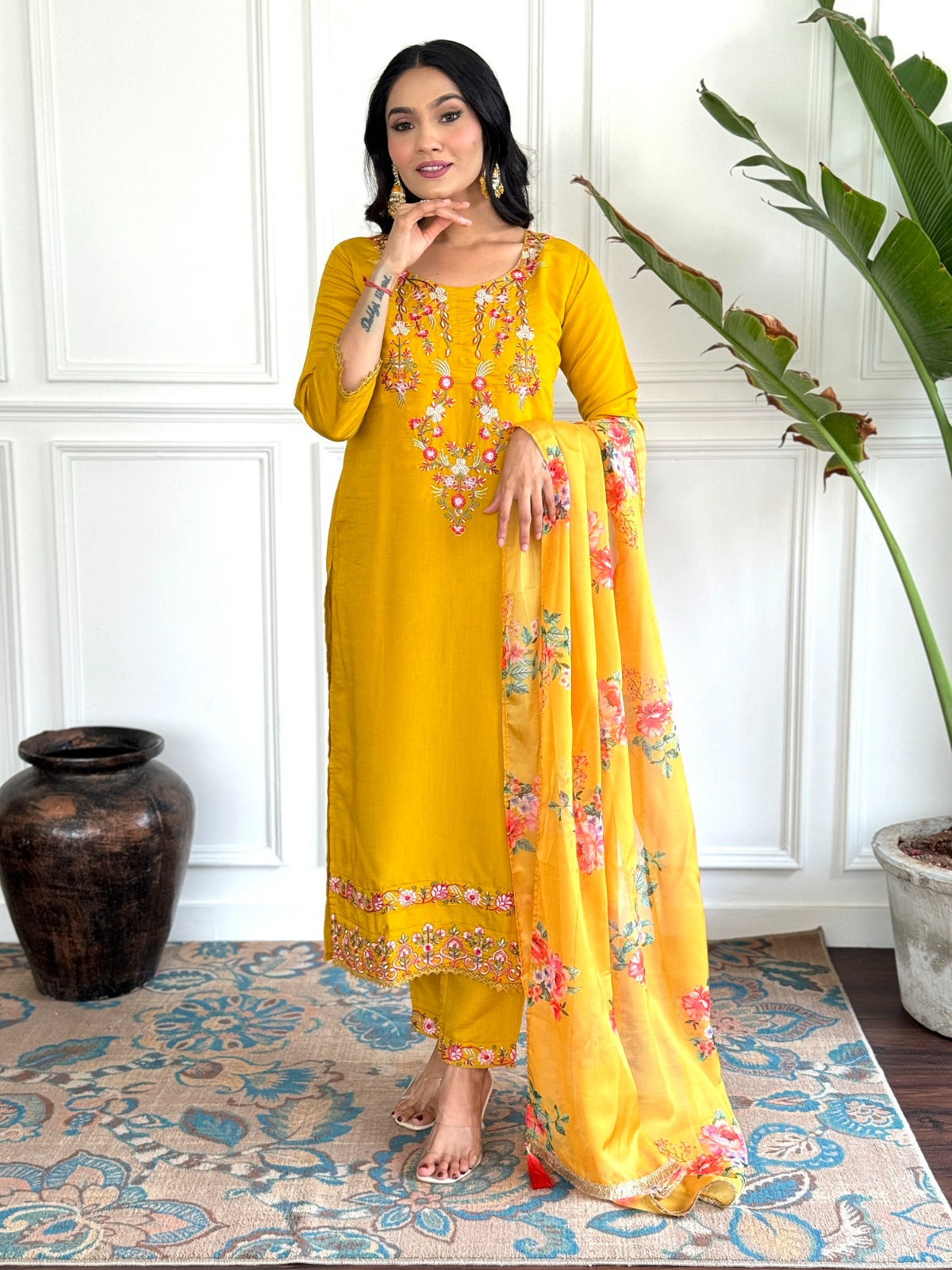 Elevate your style with this vibrant mustard yellow kurti set, adorned with intricate floral embroidery and a beautifully printed dupatta