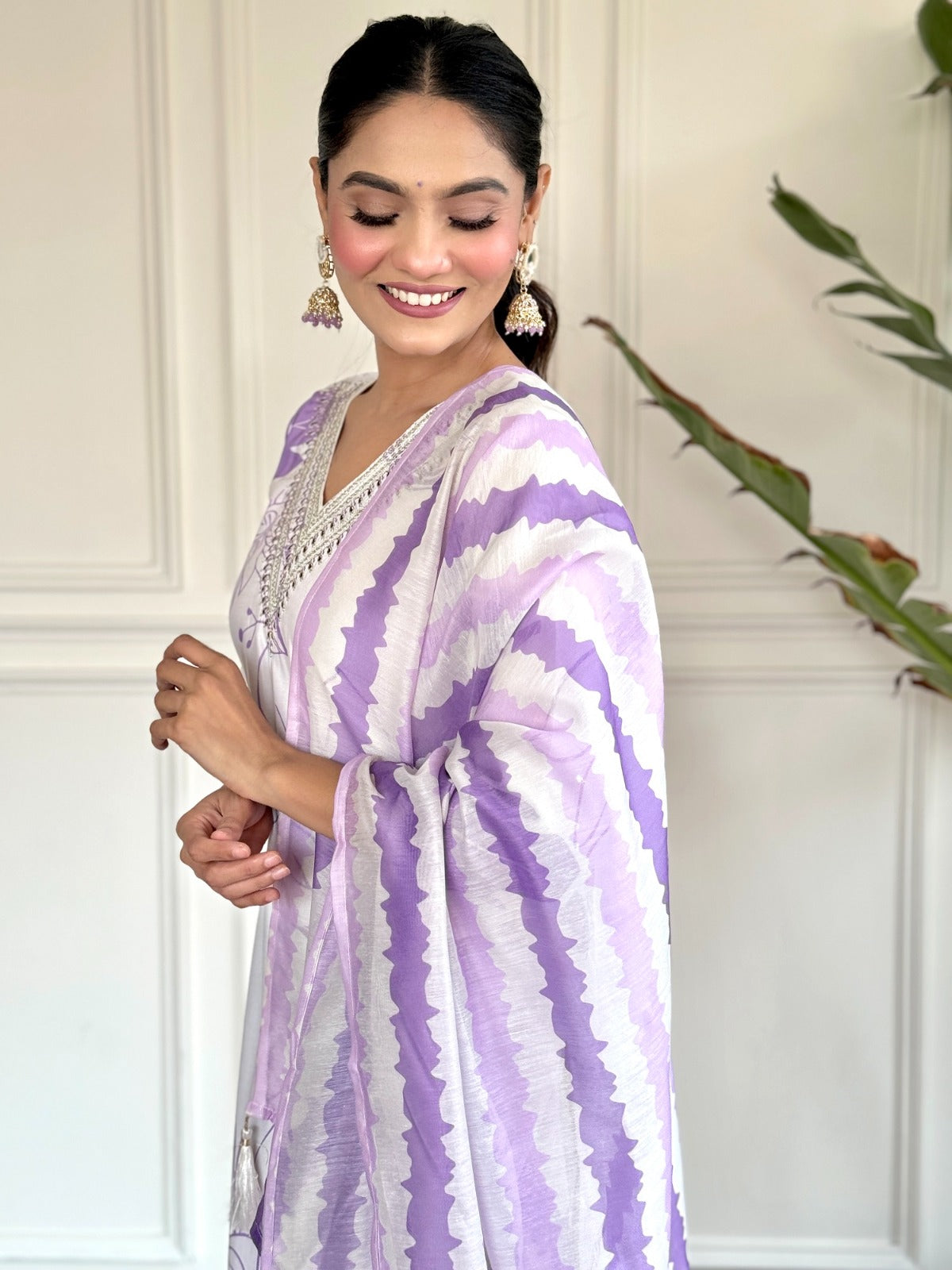 Step into effortless elegance with this soft lavender and white kurti set