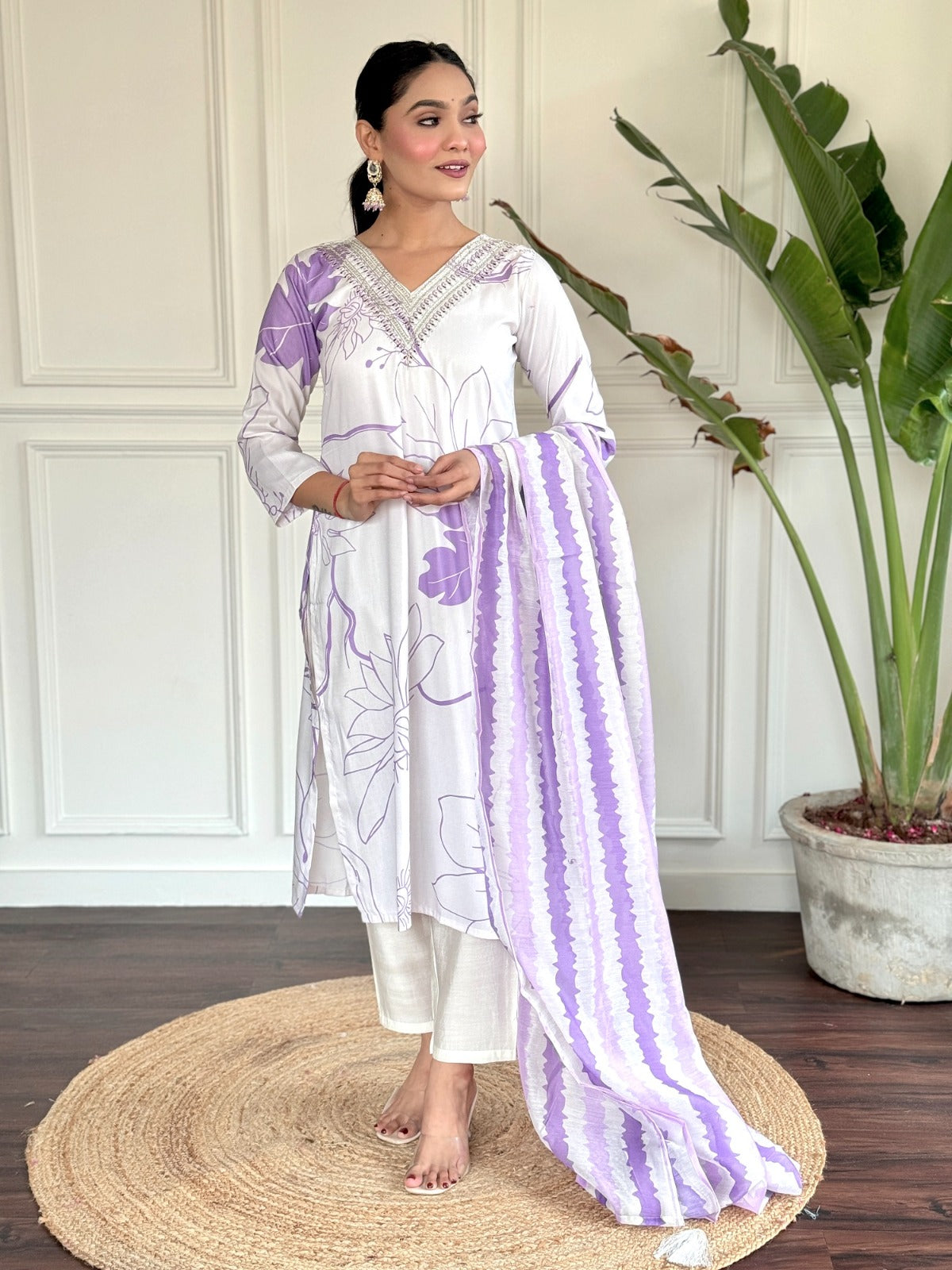 Step into effortless elegance with this soft lavender and white kurti set