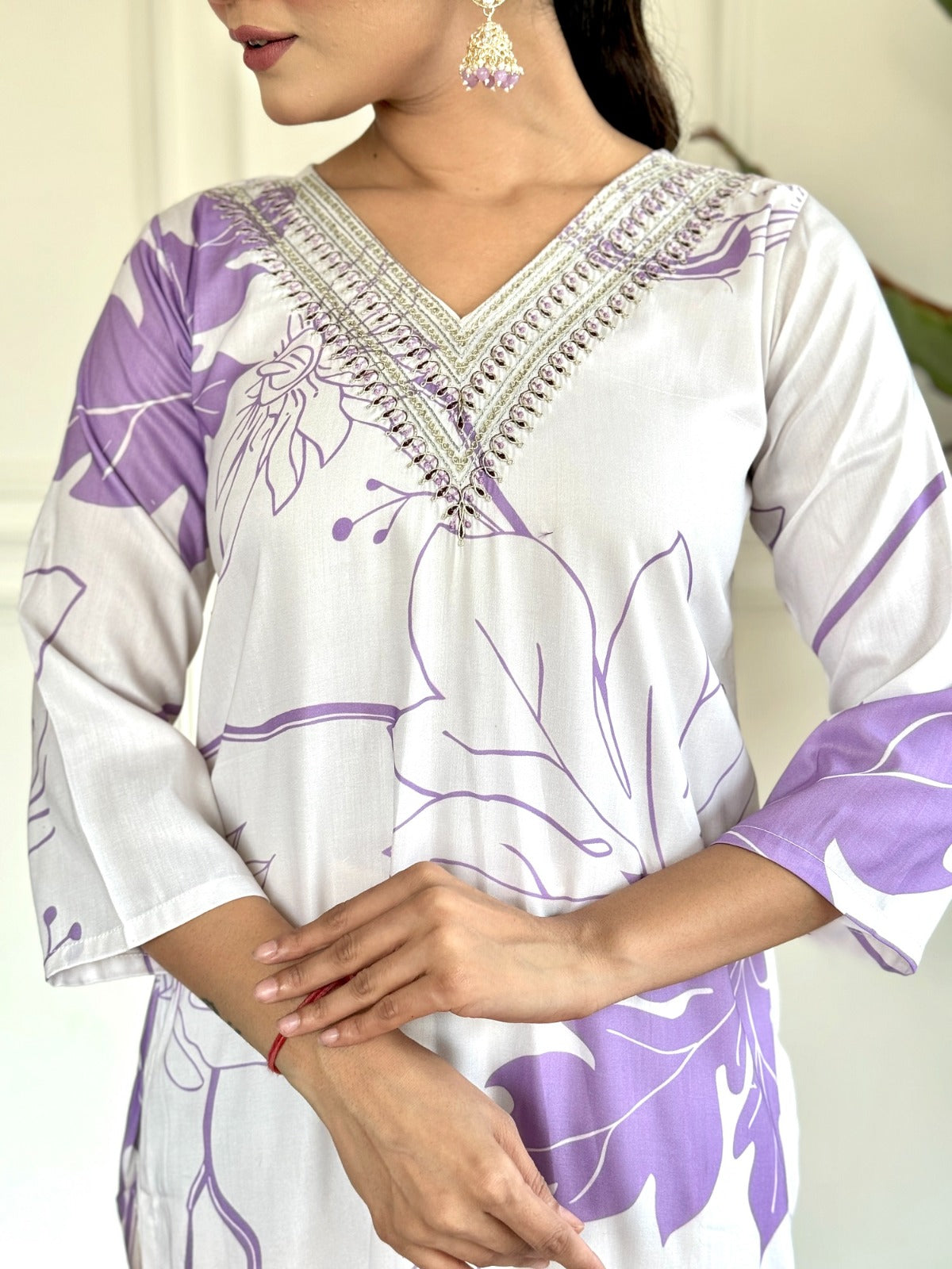 Step into effortless elegance with this soft lavender and white kurti set