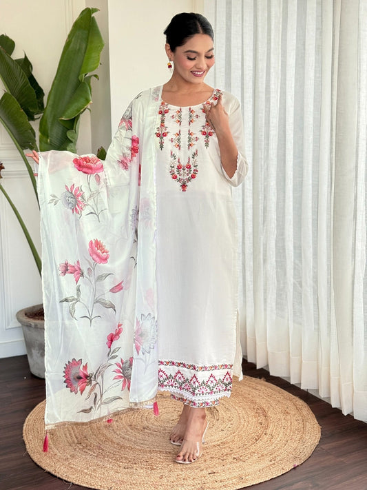 Step into elegance with this pristine white kurti set, beautifully adorned with delicate floral embroidery