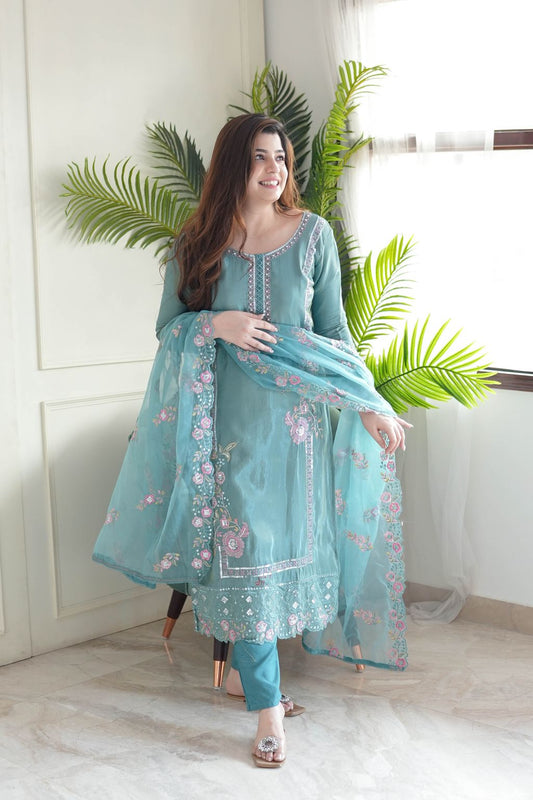 This stunning aqua blue kurti set is crafted with intricate floral embroidery, delicate embellishments, and a sheer dupatta for an elegant finish