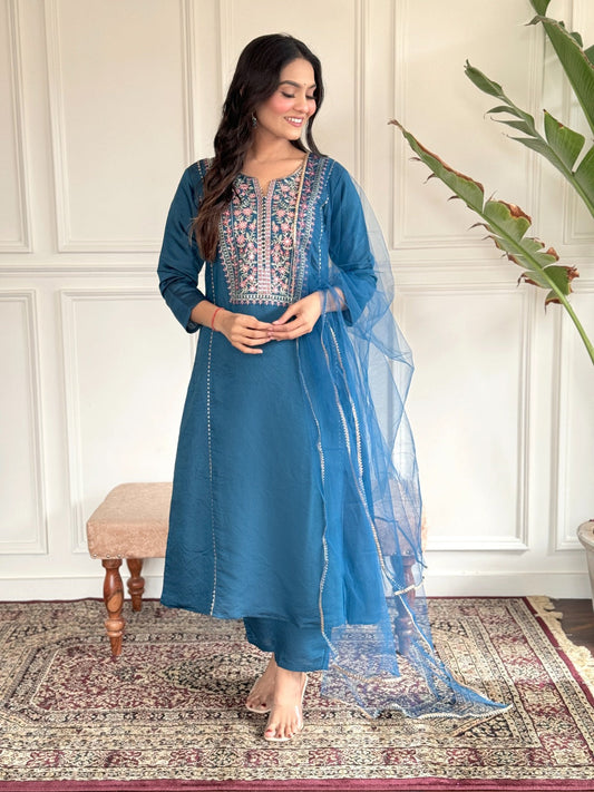 "Make a statement in this gorgeous teal blue kurti set, adorned with intricate embroidery and delicate detailing