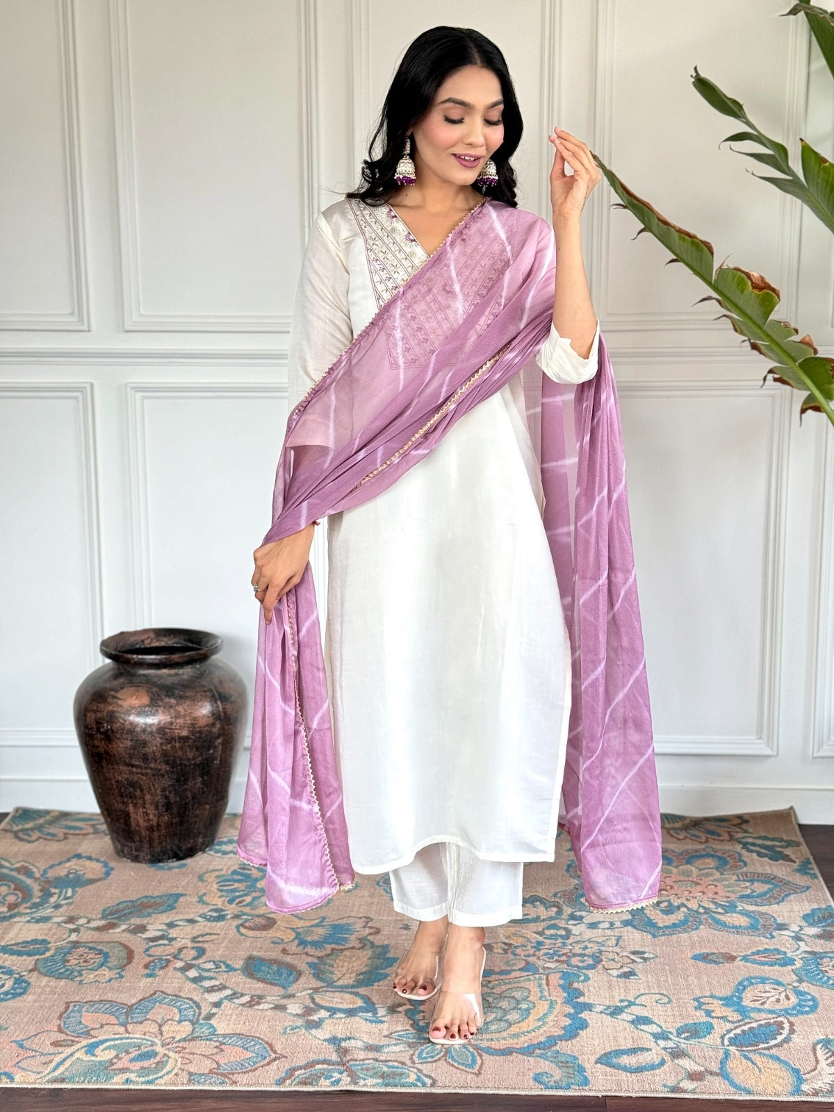 mbrace timeless elegance with this ivory kurti set, featuring delicate embroidery and a soft tie-dye dupatta in pastel hues