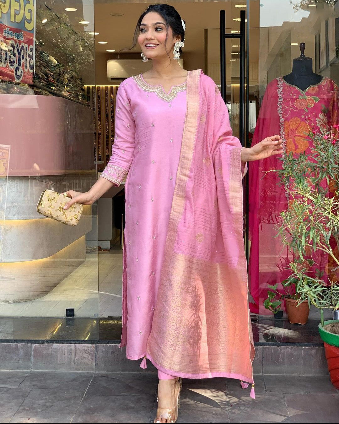 Elevate your style with this elegant maroon,Purpal and lighat pink kurti set, adorned with delicate embroidery and a rich, traditional dupatta