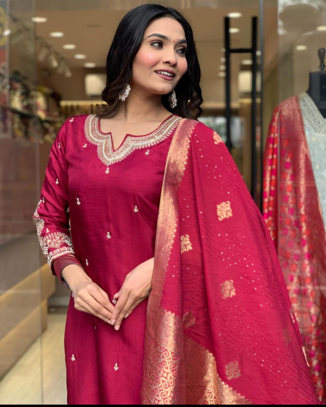 Elevate your style with this elegant maroon,Purpal and lighat pink kurti set, adorned with delicate embroidery and a rich, traditional dupatta
