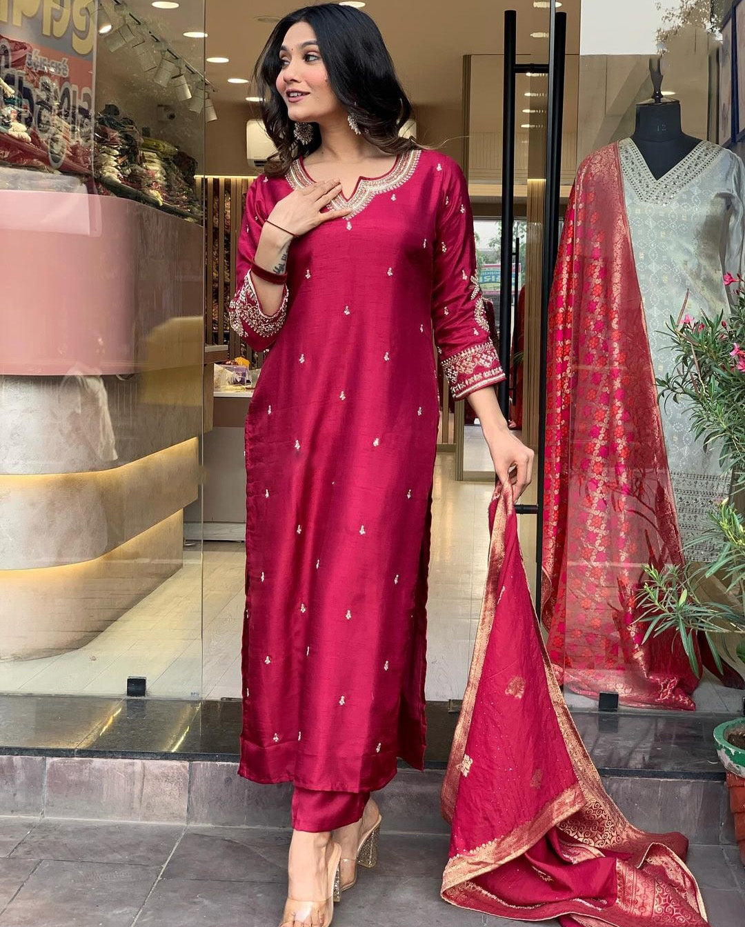 Elevate your style with this elegant maroon,Purpal and lighat pink kurti set, adorned with delicate embroidery and a rich, traditional dupatta