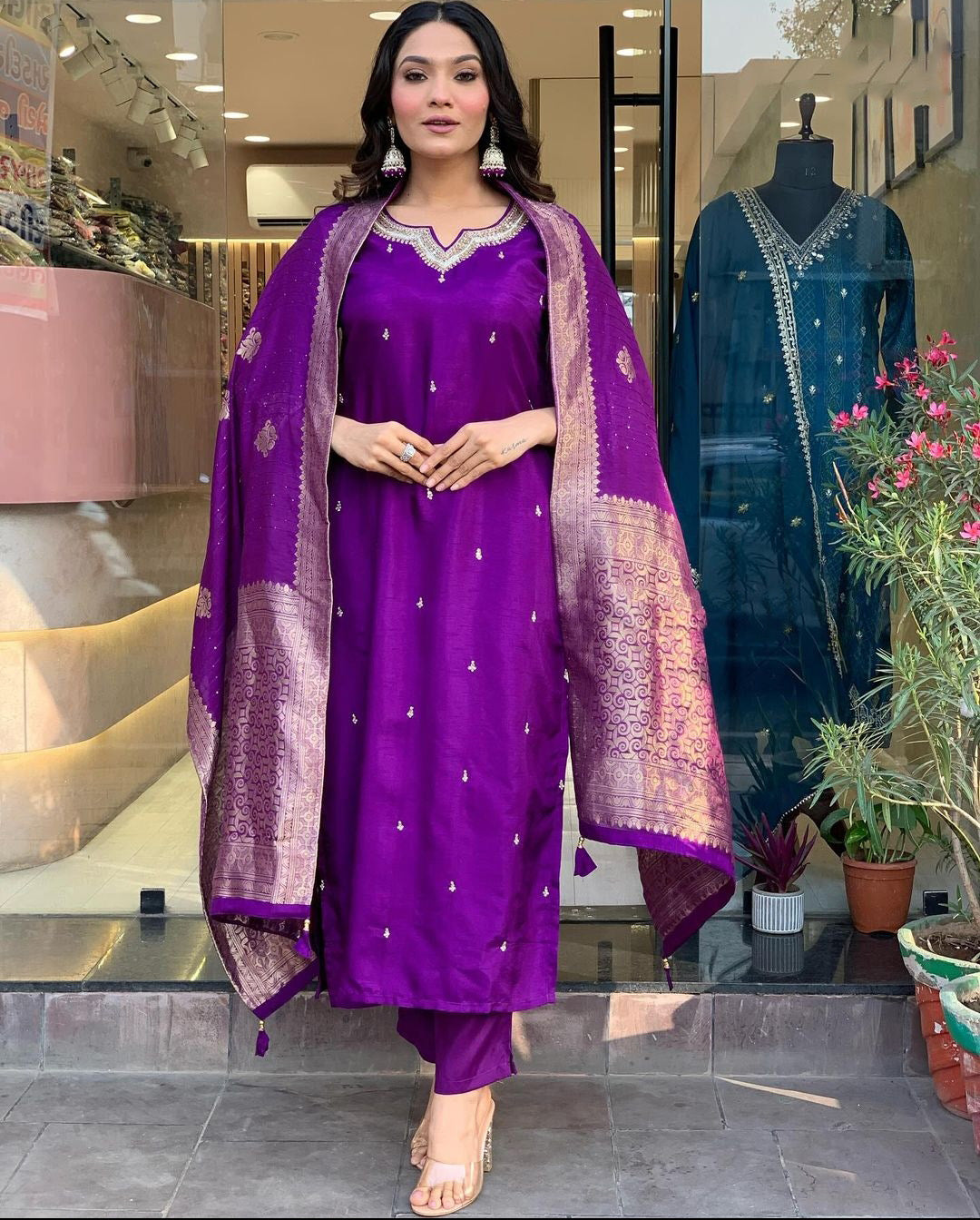 Elevate your style with this elegant maroon,Purpal and lighat pink kurti set, adorned with delicate embroidery and a rich, traditional dupatta