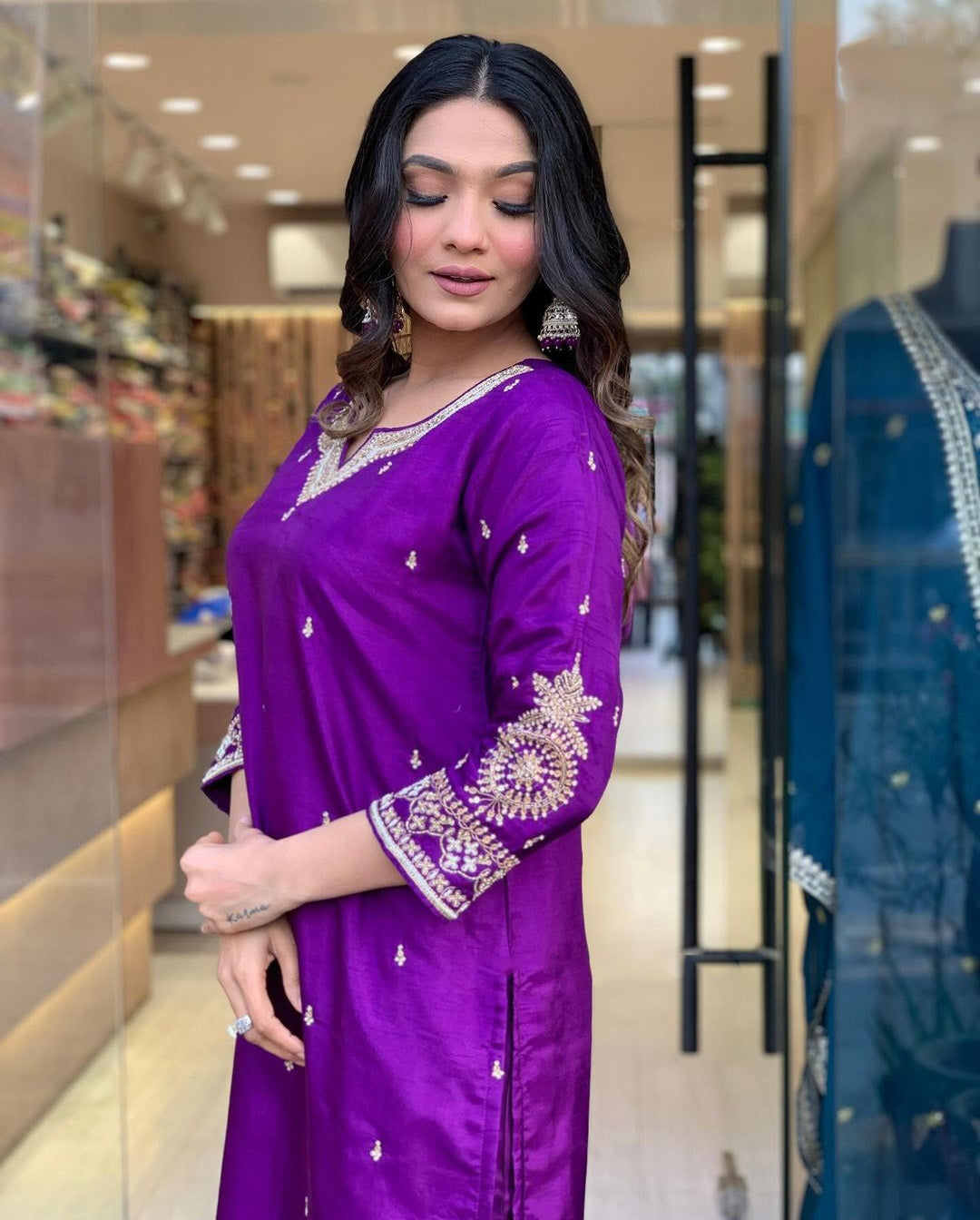 Elevate your style with this elegant maroon,Purpal and lighat pink kurti set, adorned with delicate embroidery and a rich, traditional dupatta
