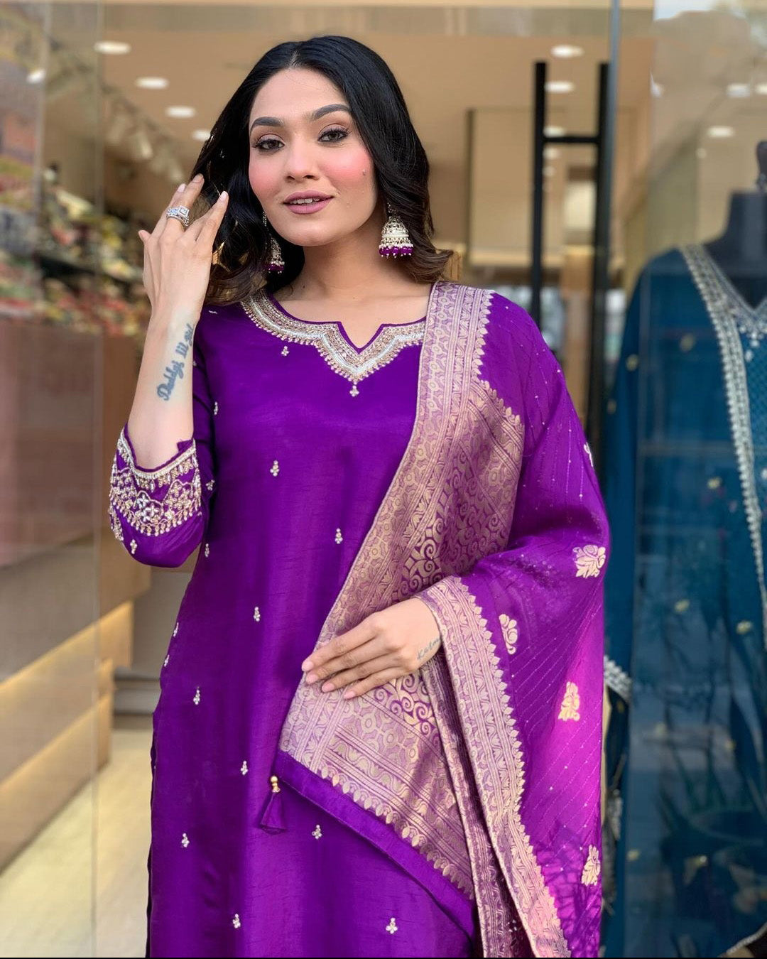 Elevate your style with this elegant maroon,Purpal and lighat pink kurti set, adorned with delicate embroidery and a rich, traditional dupatta