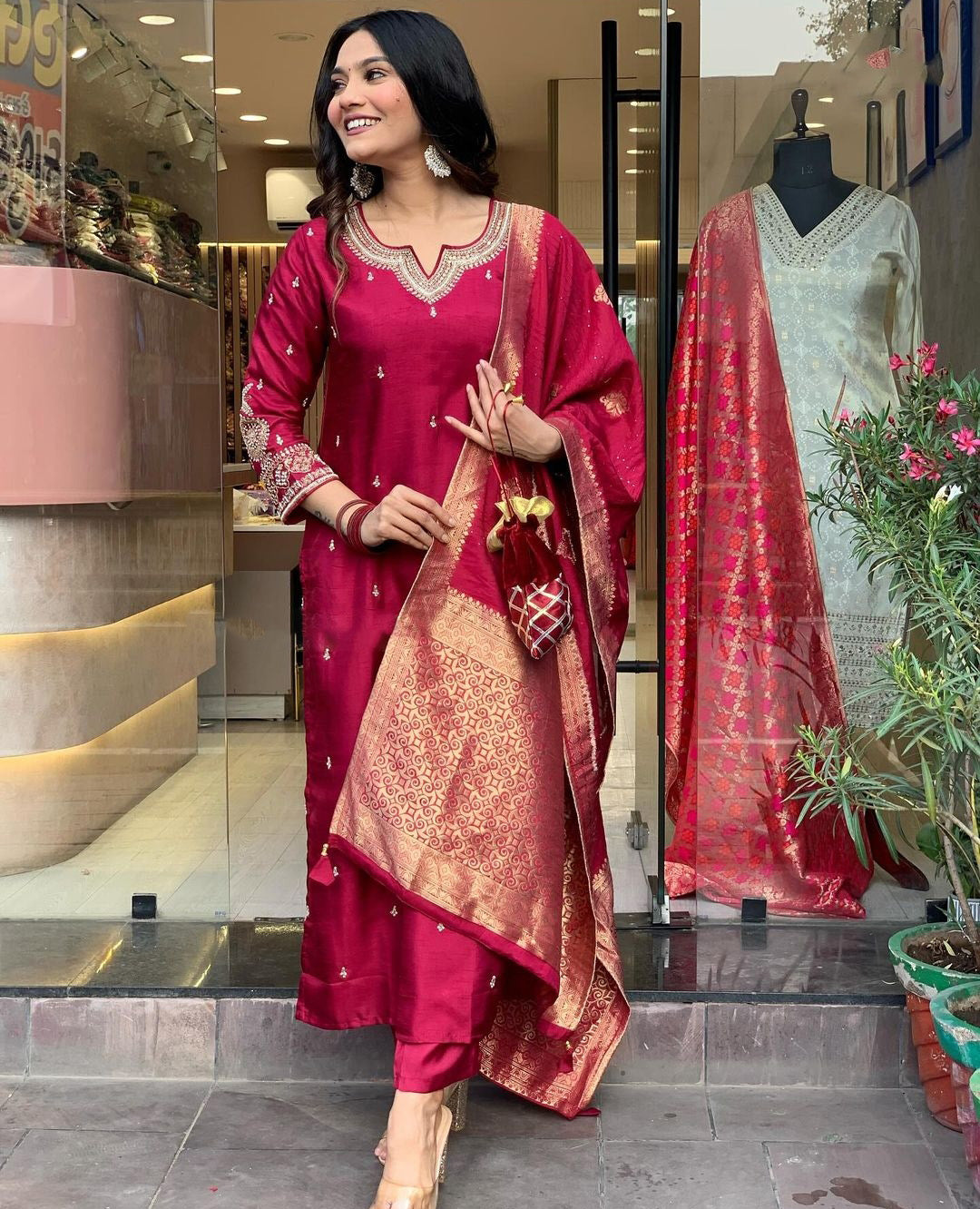 Elevate your style with this elegant maroon,Purpal and lighat pink kurti set, adorned with delicate embroidery and a rich, traditional dupatta