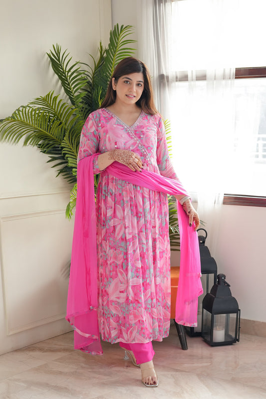 Step into elegance with this stunning pink floral kurti set, featuring delicate embroidery and a flowy silhouette