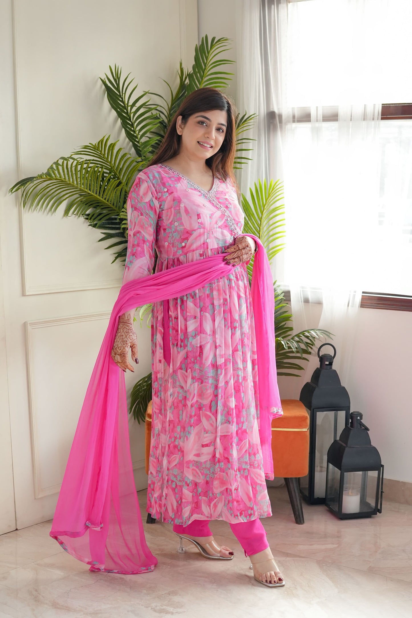 Step into elegance with this stunning pink floral kurti set, featuring delicate embroidery and a flowy silhouette