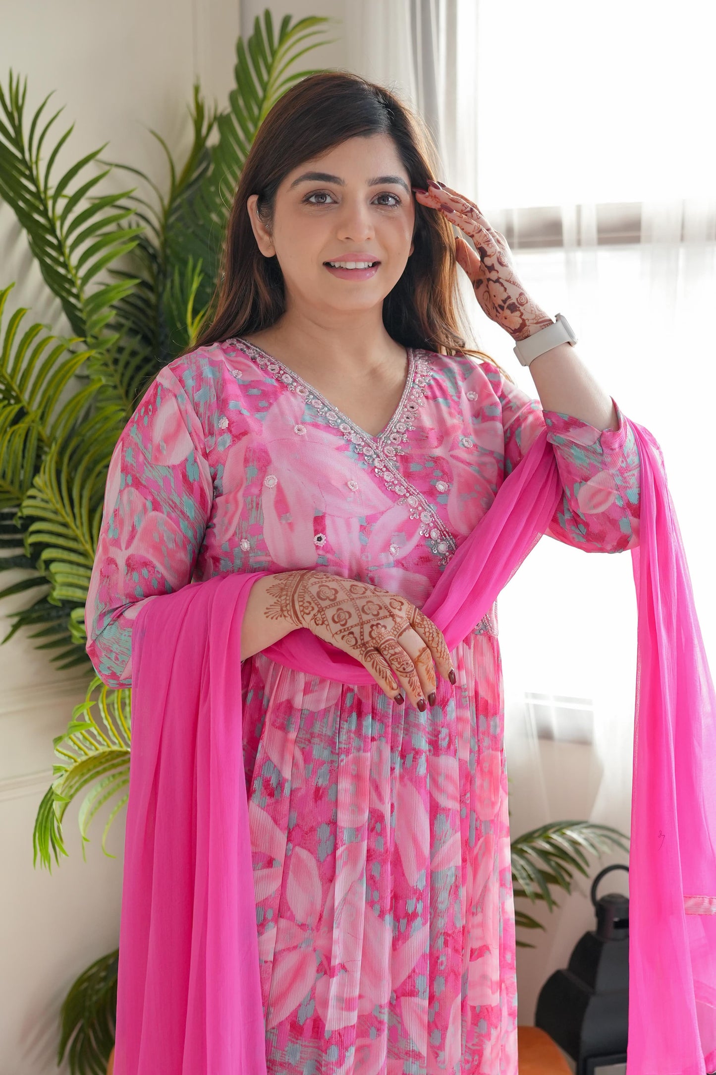 Step into elegance with this stunning pink floral kurti set, featuring delicate embroidery and a flowy silhouette
