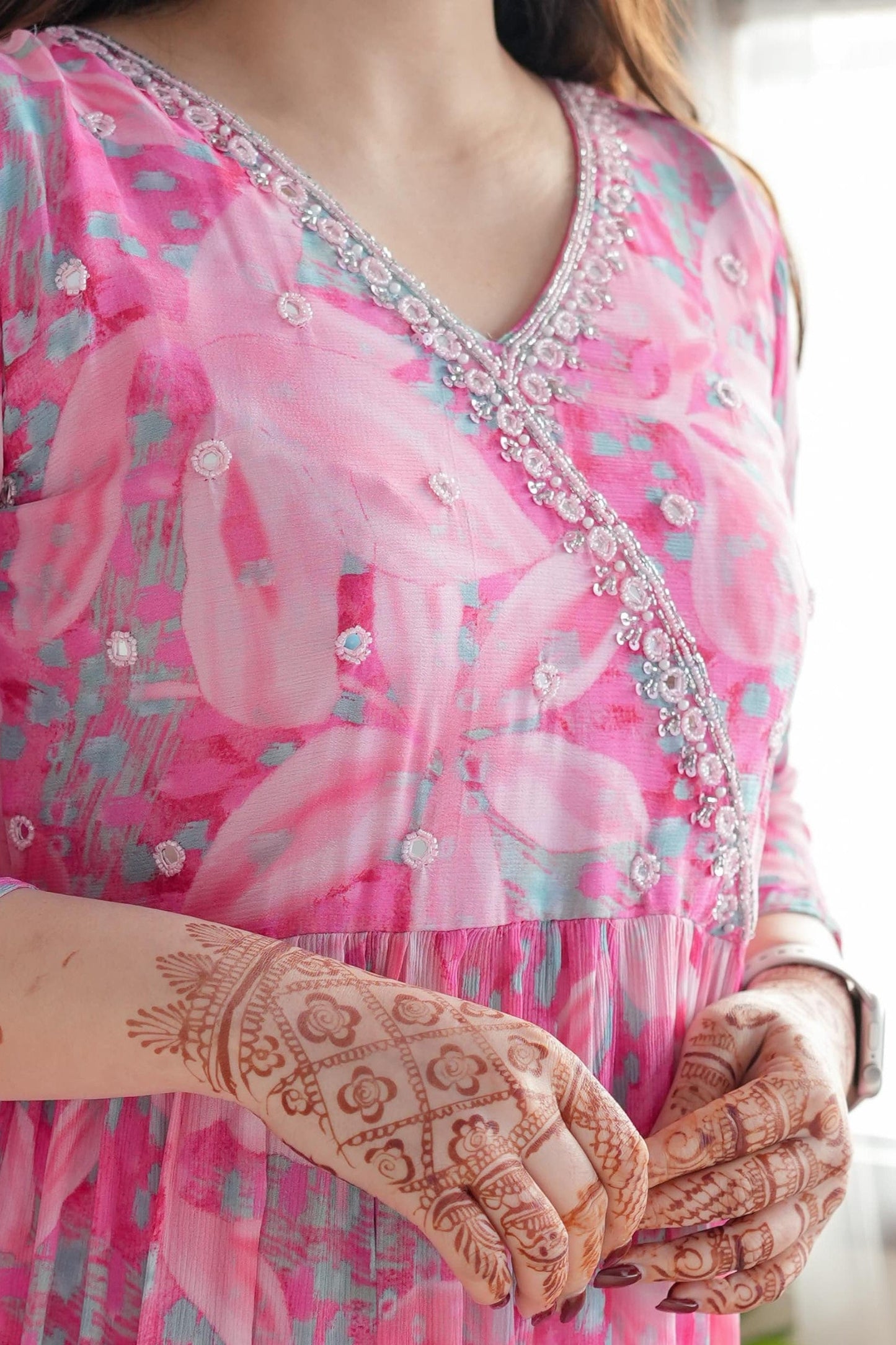 Step into elegance with this stunning pink floral kurti set, featuring delicate embroidery and a flowy silhouette