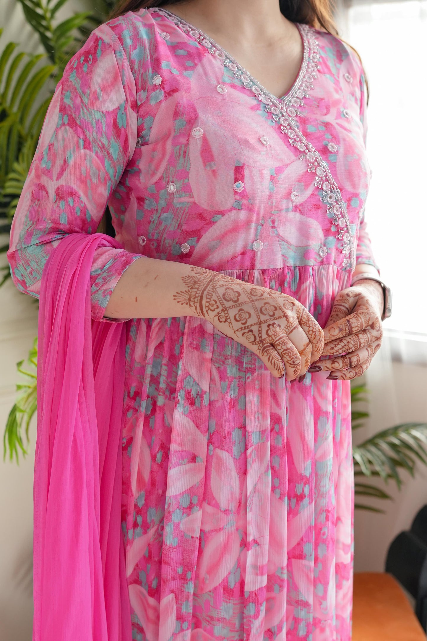 Step into elegance with this stunning pink floral kurti set, featuring delicate embroidery and a flowy silhouette