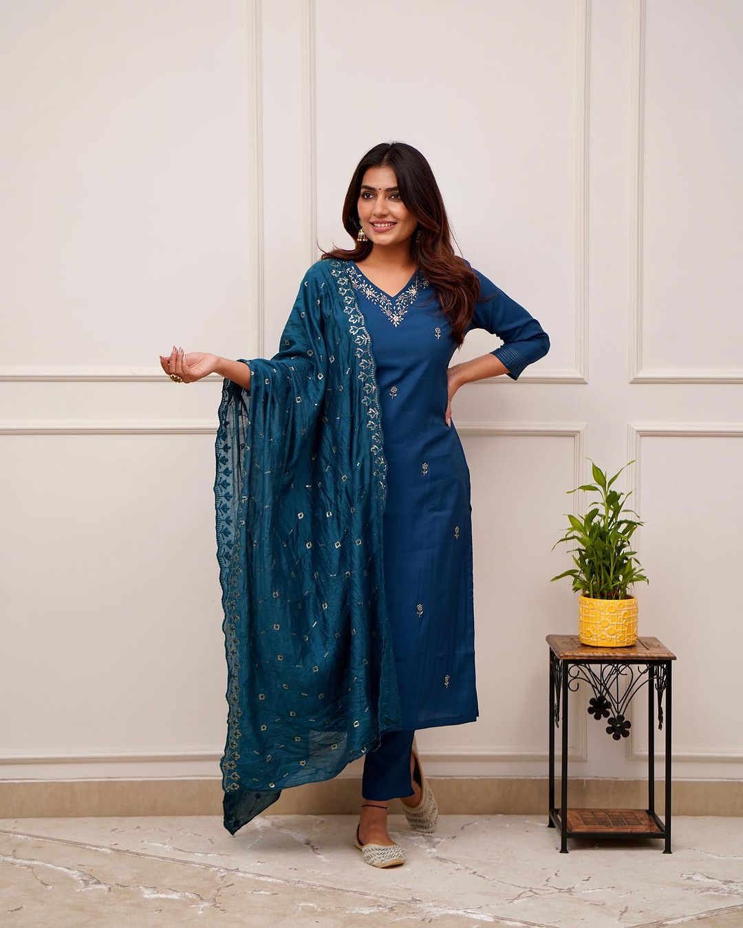 Step into elegance with this stunning deep blue,Yellow and Purpal kurti set, featuring intricate embroidery and a beautifully detailed dupatta