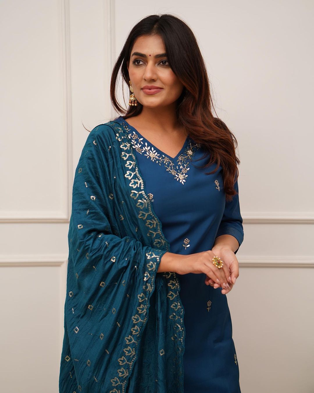 Step into elegance with this stunning deep blue,Yellow and Purpal kurti set, featuring intricate embroidery and a beautifully detailed dupatta