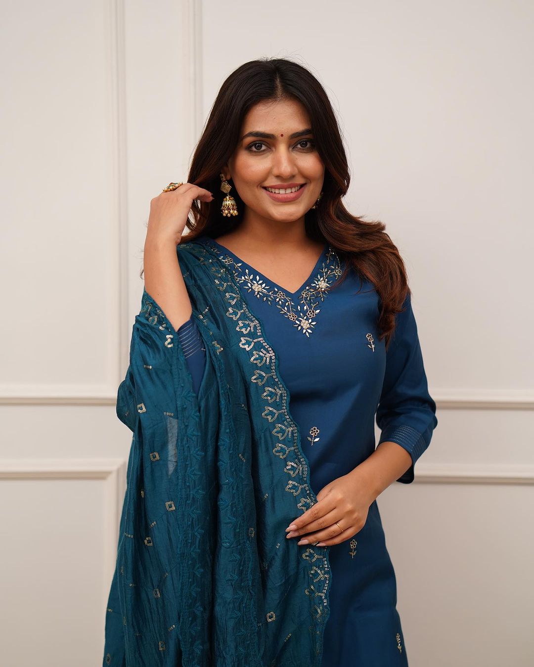 Step into elegance with this stunning deep blue,Yellow and Purpal kurti set, featuring intricate embroidery and a beautifully detailed dupatta