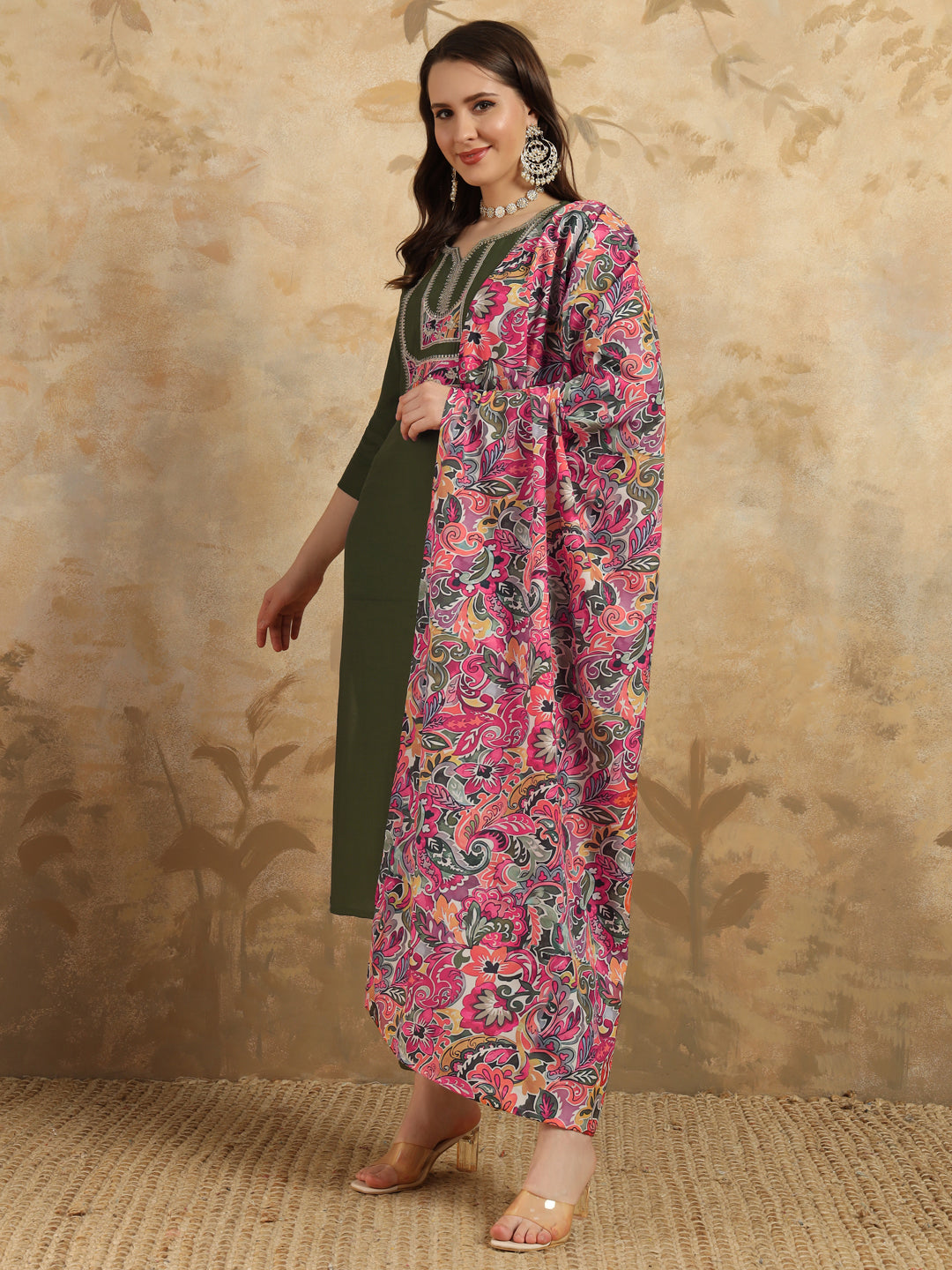 Elevate your style with this elegant olive green kurta set, featuring intricate embroidery and a vibrant paisley-print dupatta28)