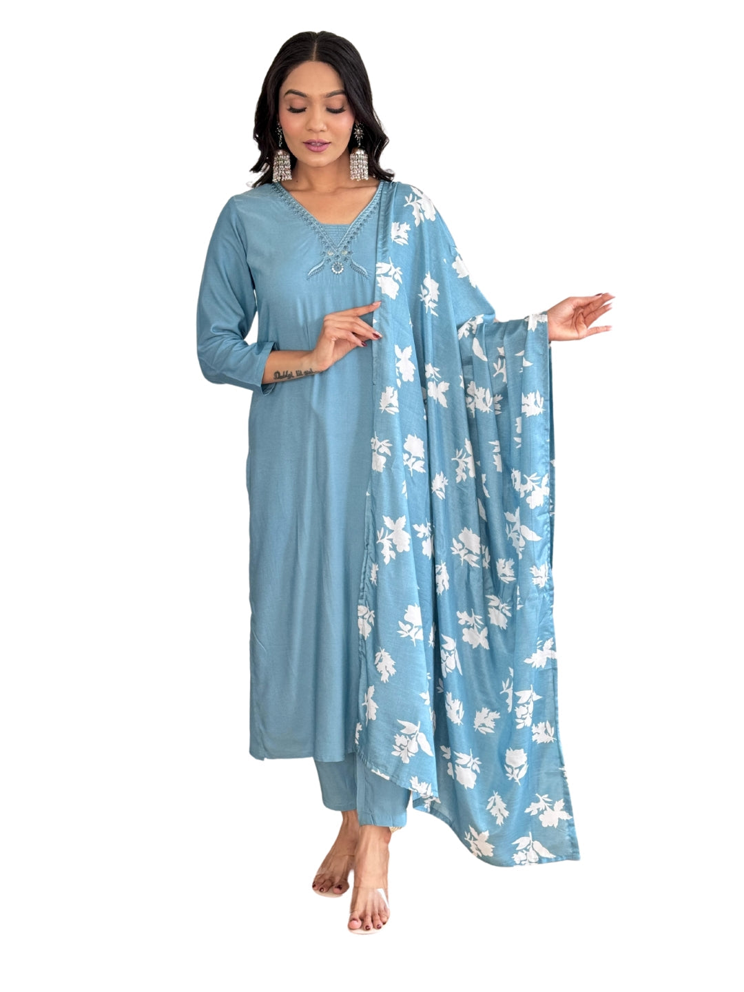 Exude elegance in this serene blue kurta set, adorned with delicate embroidery and a charming floral-print dupatta